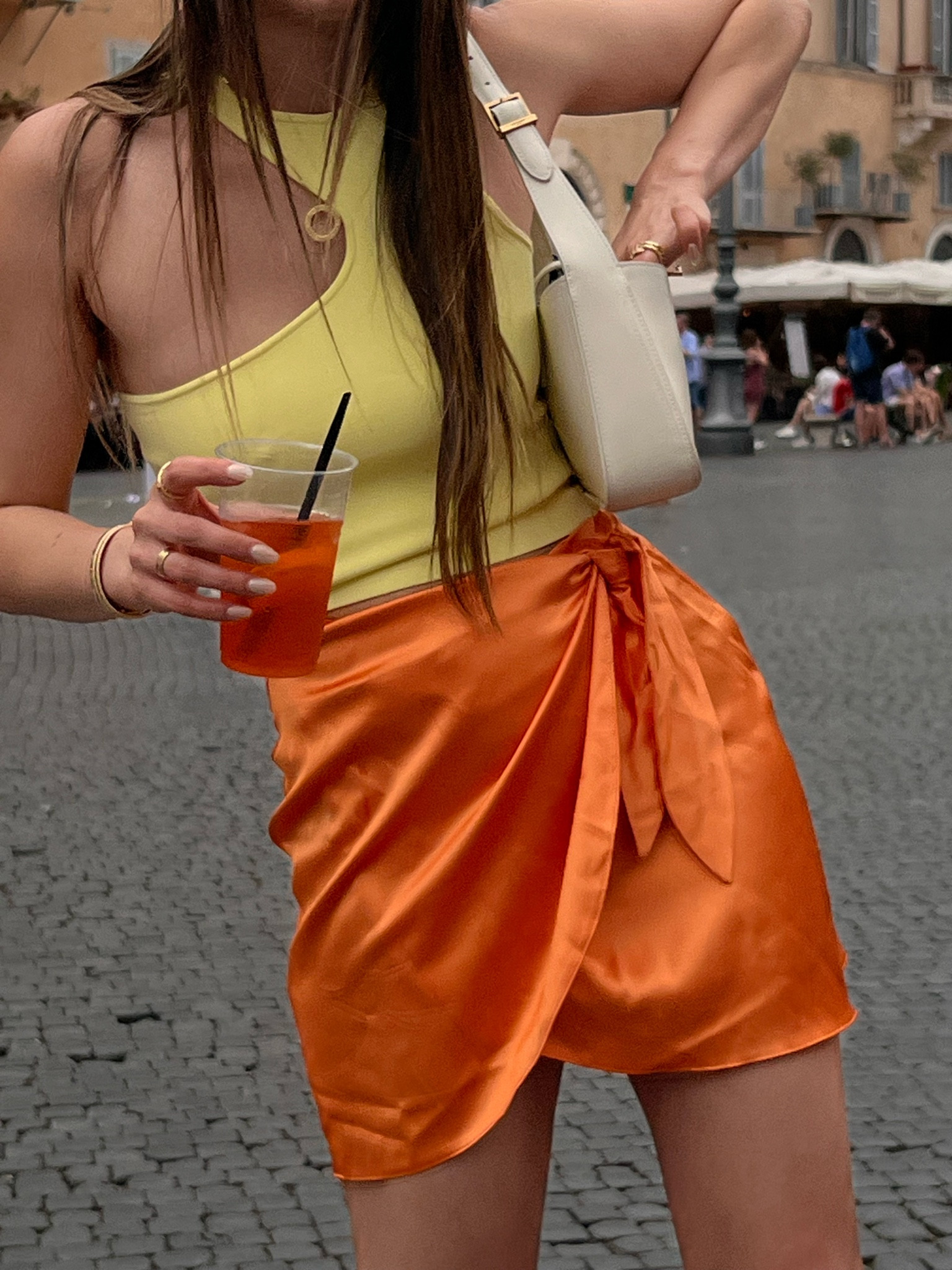 The top on the photo is size M because I got it when I was weighing higher BUT ever since than I lost weight so to my current body S would have fit better. My chest is 85 cm right now and waist is 65 cm. 


Orange mini skirt, orange skirt, yellow top, pastel yellow top, gelato, pastel color, italy 

#LTKStyleTip