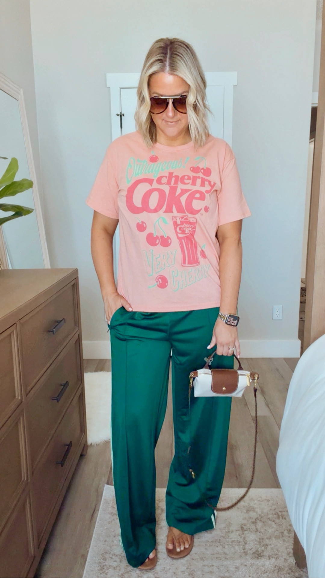 Comfy but make it cute 🍒🥤
Graphic tee + flowy pants = perfect mom-on-the-go fit. 

Tee - sized up to XL
Pants - large 
Flops - size up 1

#LTKOver40 #LTKmomlife #LTKMidsize