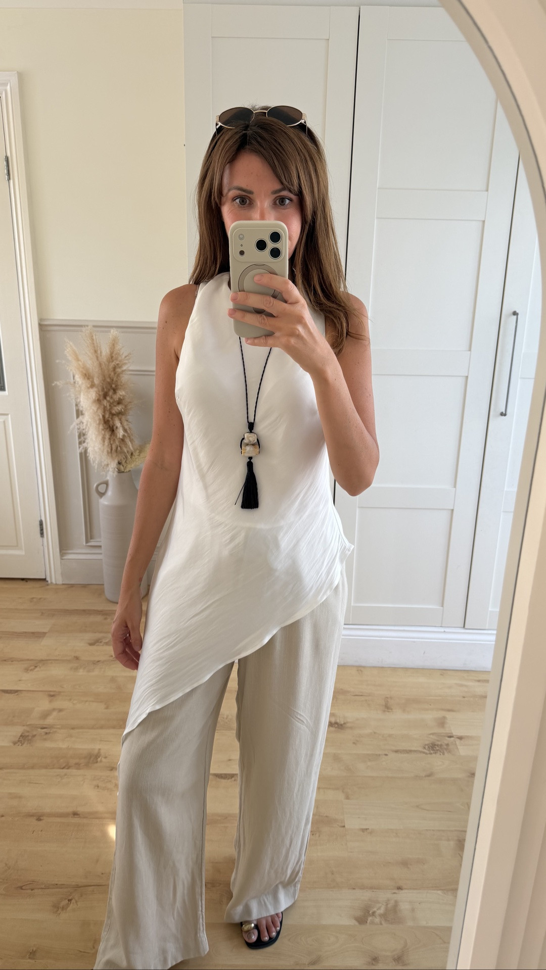 Such a gorgeous top! So versatile, you can easily dress it up or down.

Top size 12 ( If you’re between sizes, I’d recommend sizing up).
Trousers size 10 regular.
Necklace is not online.

#LTKuk #LTKeurope #LTKsummer #Whitetop