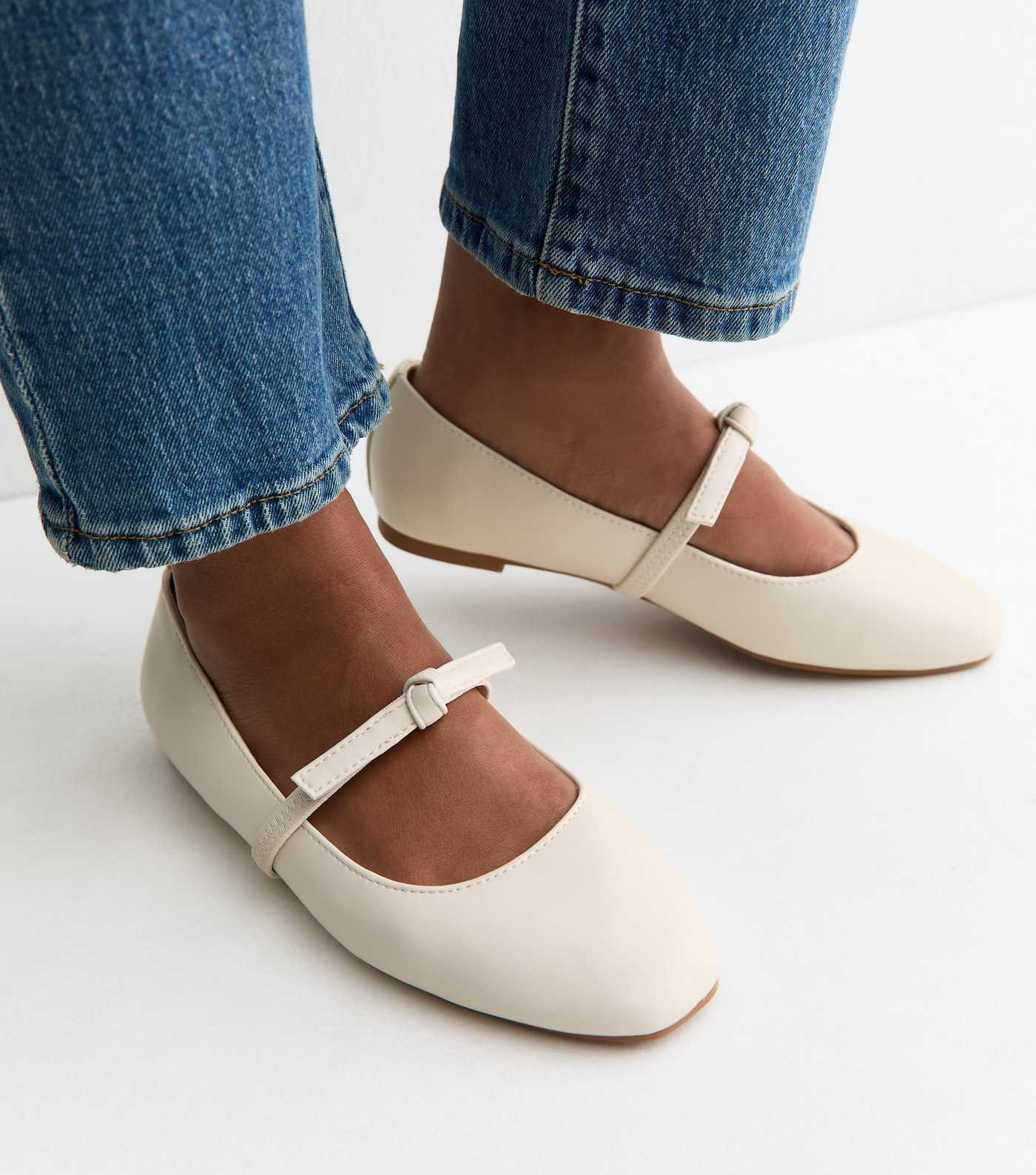 Wide Fit  Off White Faux Leather Bow Strap Mary Jane Flats | New Look | New Look (UK)
