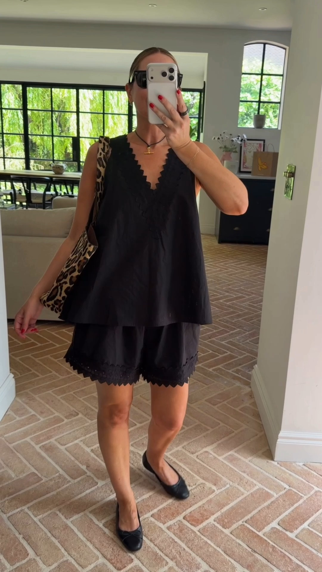 This DISSH set is so good 🖤

black linen co ord, black shorts set, linen shorts set, scallop edge co ord, scallop trim shorts, scallop hem top, black two piece set, black linen top, linen wide leg shorts, v neck linen top, black co ord women, linen co ord set, black ballet flats, ballet pumps outfit, leopard print tote bag, leopard bag styling, black and leopard outfit, gold pendant necklace, layered necklace, black outfit ideas, chic black outfit, smart casual black outfit, co ord sets women, how to style co ords, minimalist black outfit, black linen set women

#LTKsummer #LTKeurope #LTKtravel