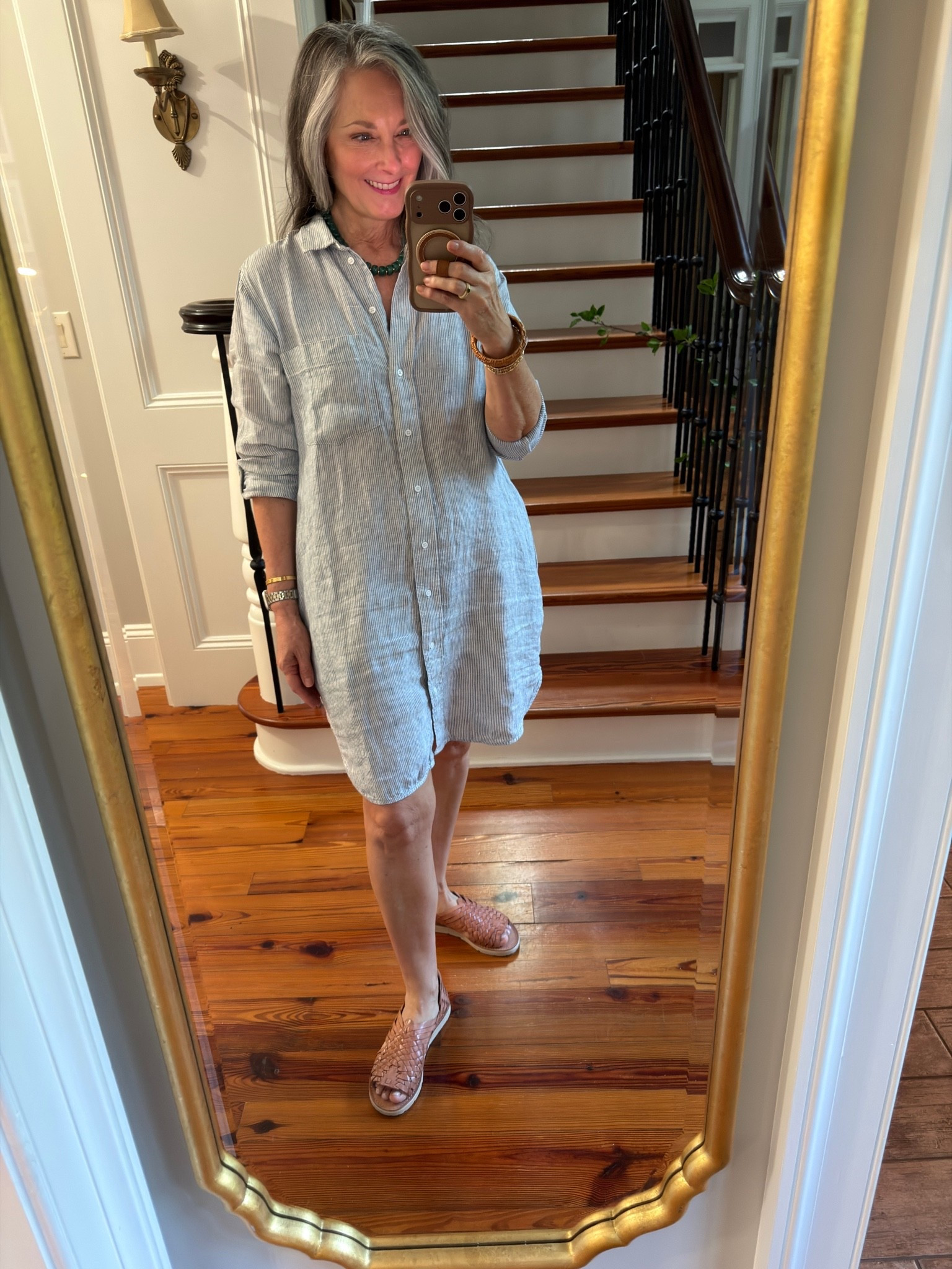 This linen shirt dress from Quince is 3 years old and still going strong! Can also double as a bathing suit cover up left unbuttoned. Amazon green beaded necklace and gold earrings. The sandals from Coldwater Creek are a fun addition.  @Coldwater Creek @Quince 

#linen #summerfashion #quietluxury #classicsummer

#LTKSeasonal #LTKOver40 #LTKootd