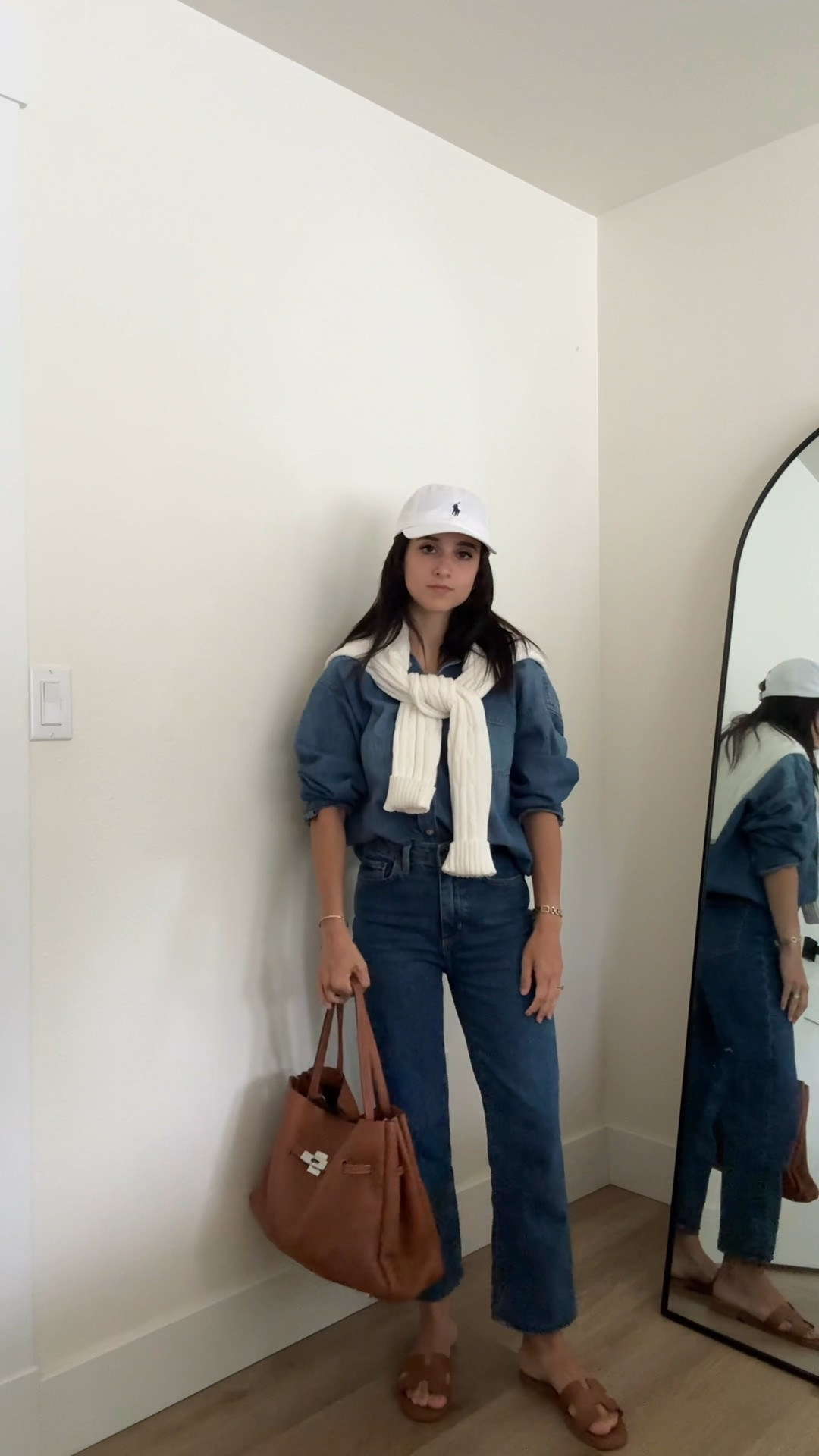 I love a denim on denim combination! I finally found a combo where the colors match pretty well! (From the same brand and it’s on sale right now!) 
I believe a look like this needs contrast. I styled with a white cap, draped a cable knit over (does it make sense? No lol but it’s cute so I’m rolling with it 😆) 
And matching my shoes and bag! 
A pretty simple combo but with intentional styling, it look more interesting. :) 

note: I did hem these jeans about 2” ! They run tts and I’m in a size 24. The denim shirt is an XS but I could have done an XXS too! It runs big.

#LTKSaleAlert #LTKPetite #LTKootd