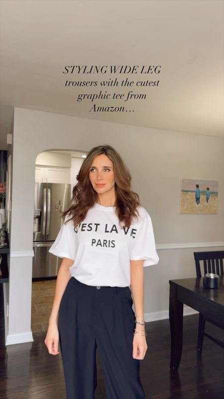 Dressy Casual Spring Outfit  | This $20 graphic tee from Amazon is the cutest! It’s also comes in black

It’s soft and has an oversized fit. So you can also wear it long with leggings and biker shorts. It would also be so cute with denim shorts. 👌

Love the classic color combo🖤

Comment Link and I will send you a link to shop this look!! Make sure you’re following or you may not see the message due to privacy settings.

Size small in tshirt and pants

Medium in coatigan

Small in denim jacket

#LTKfindsunder100 #LTKworkwear #LTKfindsunder50