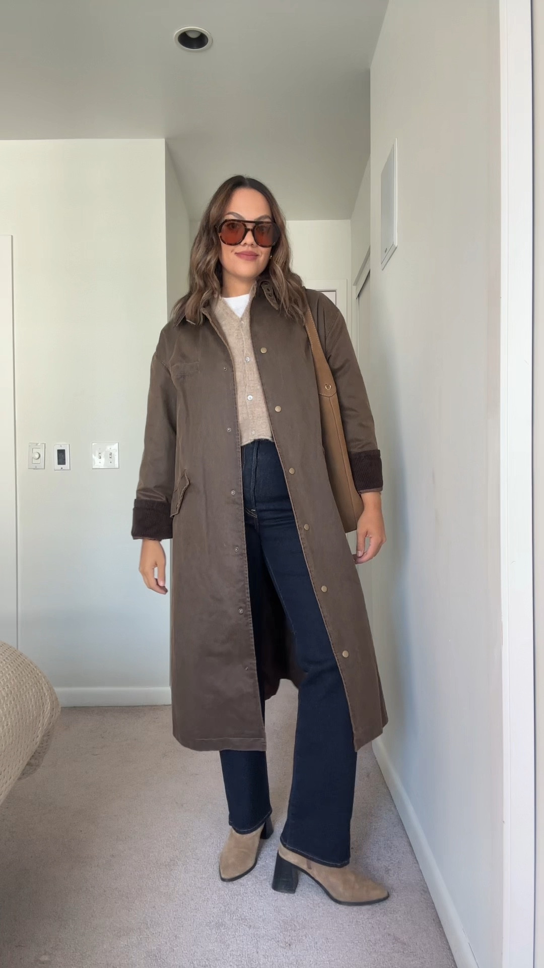 An easy fall outfit!

-Aritzia white T-shirt, I have a medium. 
-Aritzia tan fine knit cardigan, I have a size medium. 
-Zara waxed trench coat, style number 4341/881. Similar linked.  
-Levi’s ribcage straight jeans in indigo. I have a size 30x32. 
-Beige suede ankle boots, similar linked. 
-Coach tan suede shoulder bag. 
-Brown aviator sunglasses. 


#LTKautumn #LTKstyletip #LTKcanada