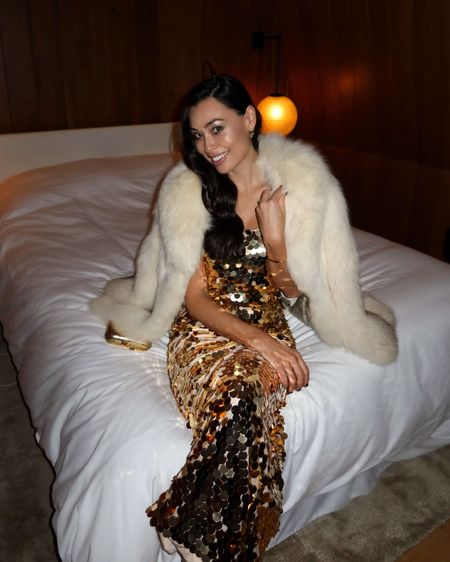 Kat Jamieson wears a vintage fur coat and sequin dress from Fashion Nova (similar below) to a Studio54 party. Holiday style, cocktail attire, gold, festive. Sale

#LTKparties #LTKHoliday