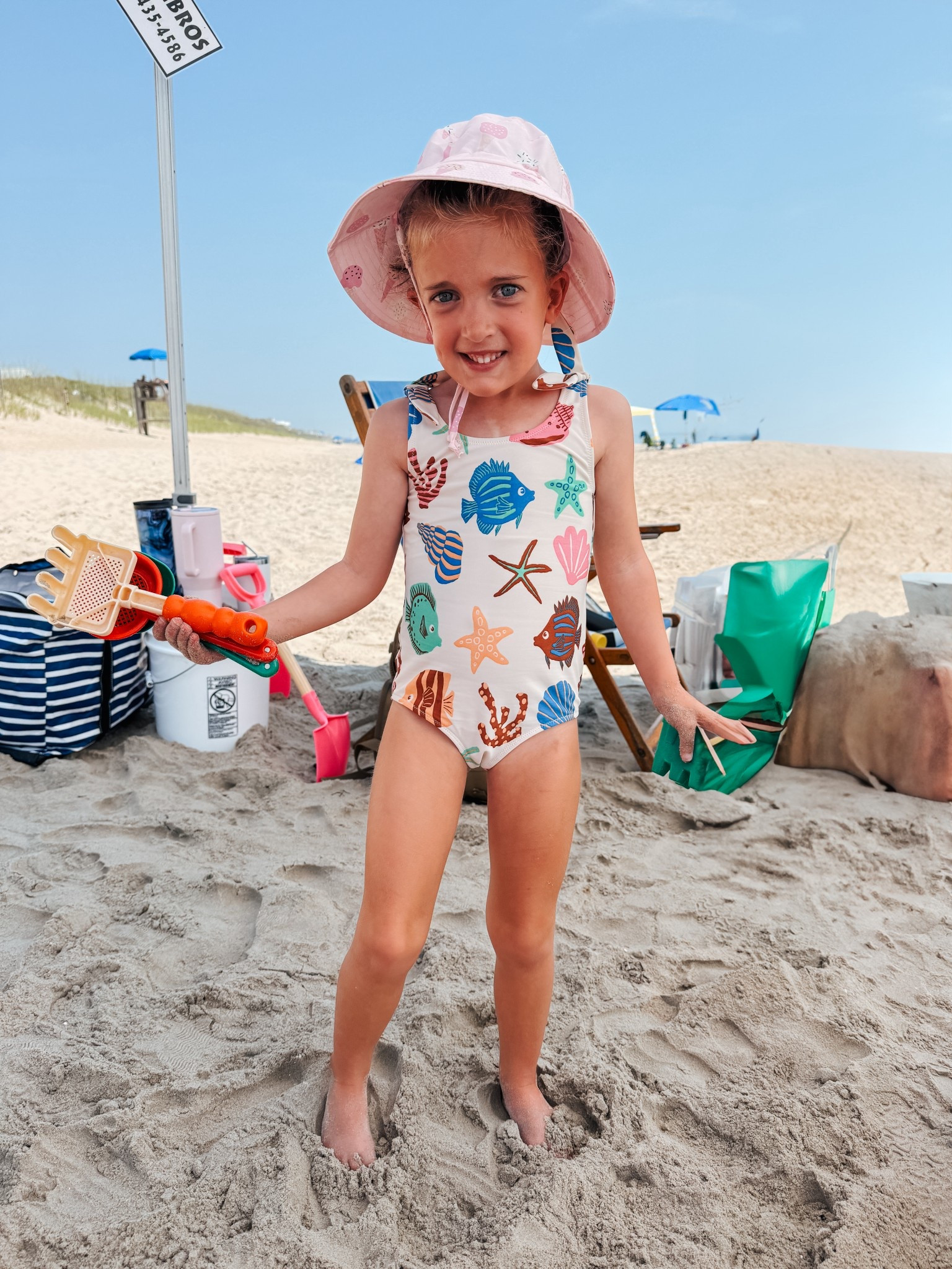 Cutest little swimsuit for beach days + the best beach/pool hat because it grows with your kiddos (so it will last a few years) and comes in tons of colors/prints. 

#LTKSeasonal #LTKSwim #LTKKids