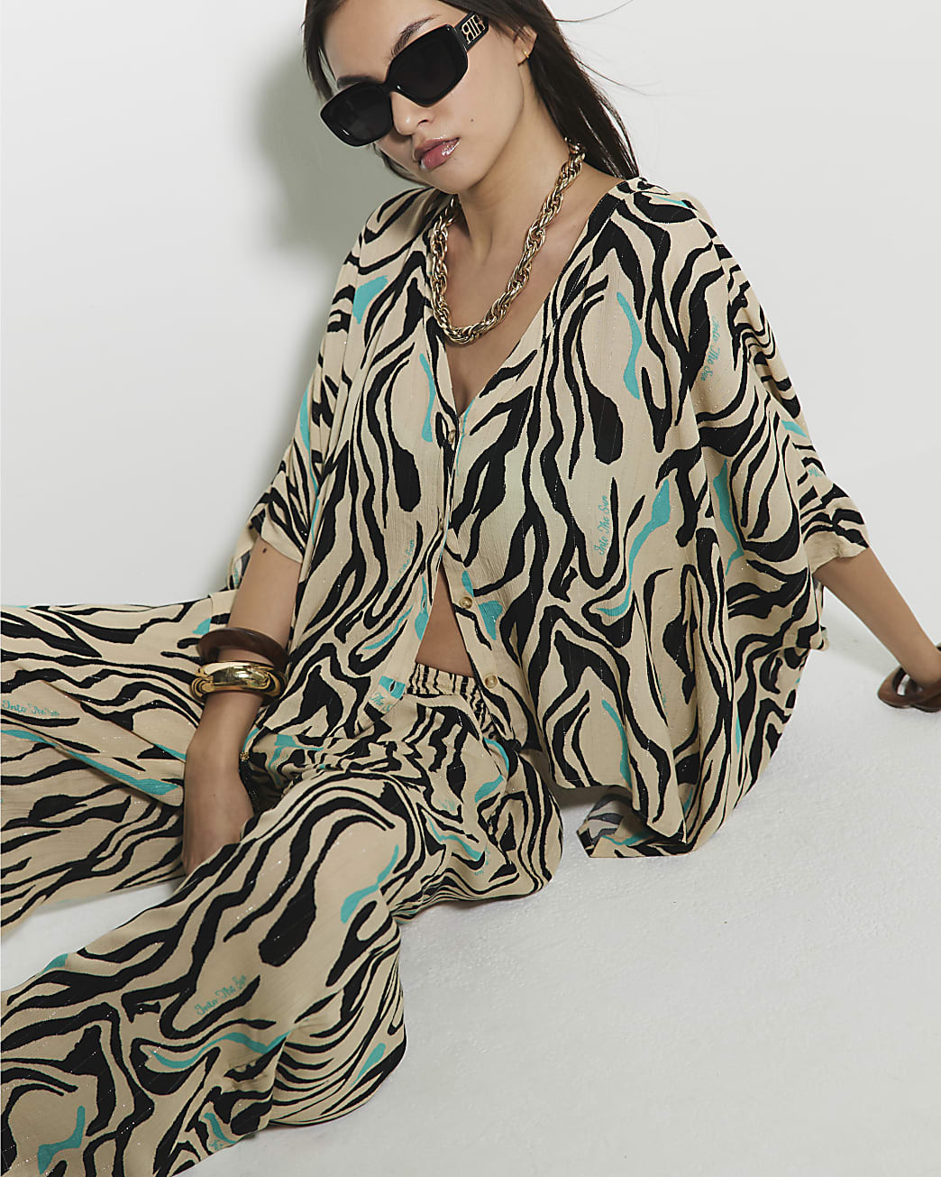 Cream Zebra Batwing Sleeve Beach Top | River Island UK & IE