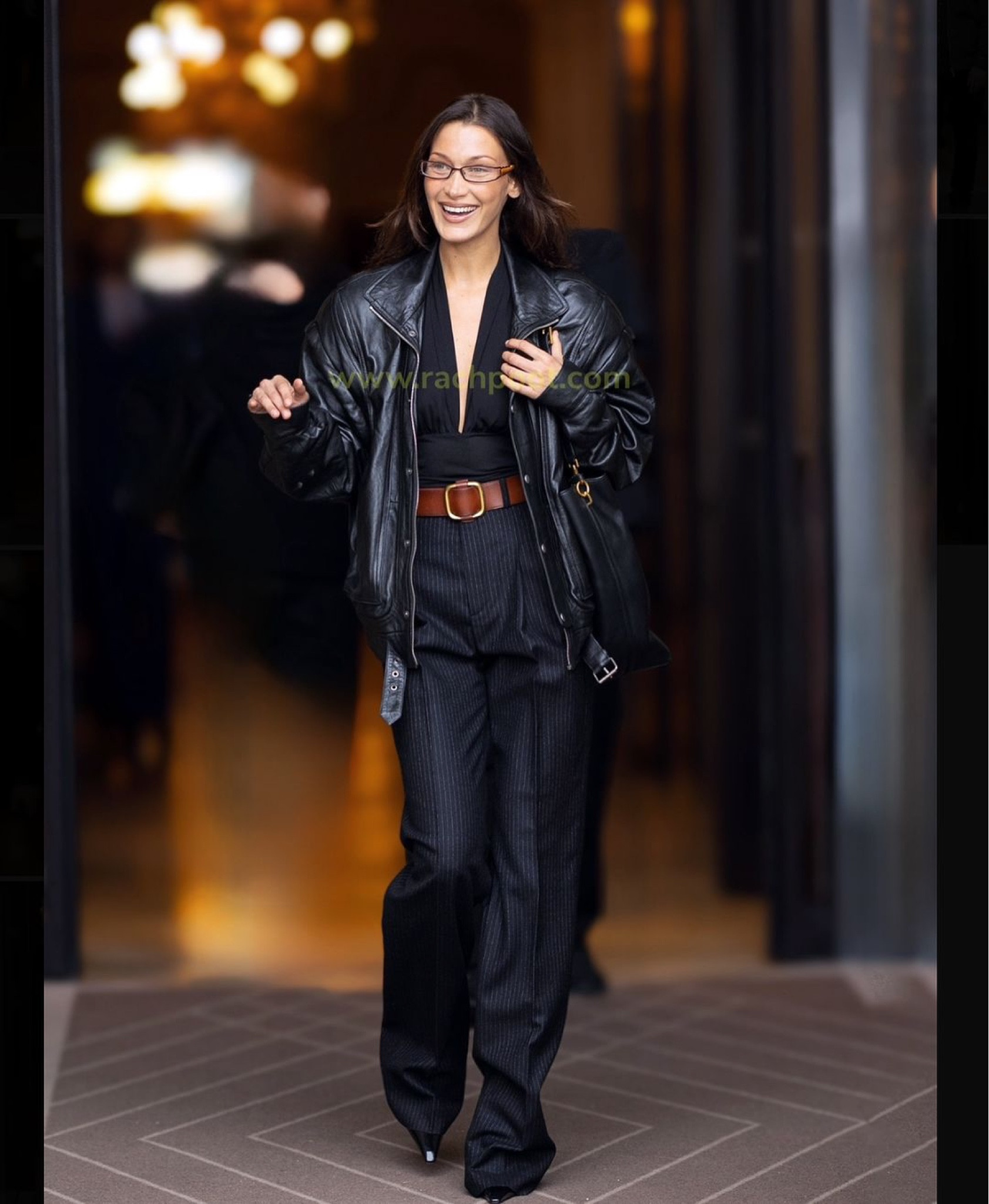 Bella Hadid was seen leaving her hotel today in a head-to-toe Saint Laurent look. She sported an oversized black leather bomber jacket, pinstripe flared pants, a leather belt and a large shoulder bag. #bellahadid #bellahadidstyle #bellahadidoutfits #hadidscloset #getthelook 

#LTKstyletip #LTKautumn #LTKbag