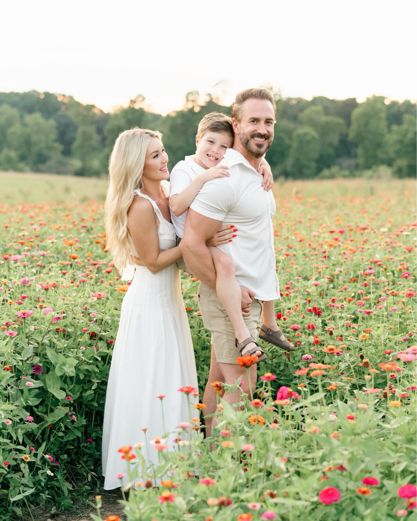 Absolutely loved our family photo shoot in this beautiful wildflower field the classic neutral white and khaki was so fitting for this shoot. I’m wearing a size small in this beautiful cut out maxi dress. Reynolds is wearing a size 8 in the Beaufort Bonnet polo shirt and size 7 his Prepletic Chino khaki shorts and size 13.5 in his Birkenstock sandals. 
For reference, I’m 5’4” tall and 122 pounds  
Reynolds is eight years old. ￼

#LTKmomlife #LTKootd #LTKKids