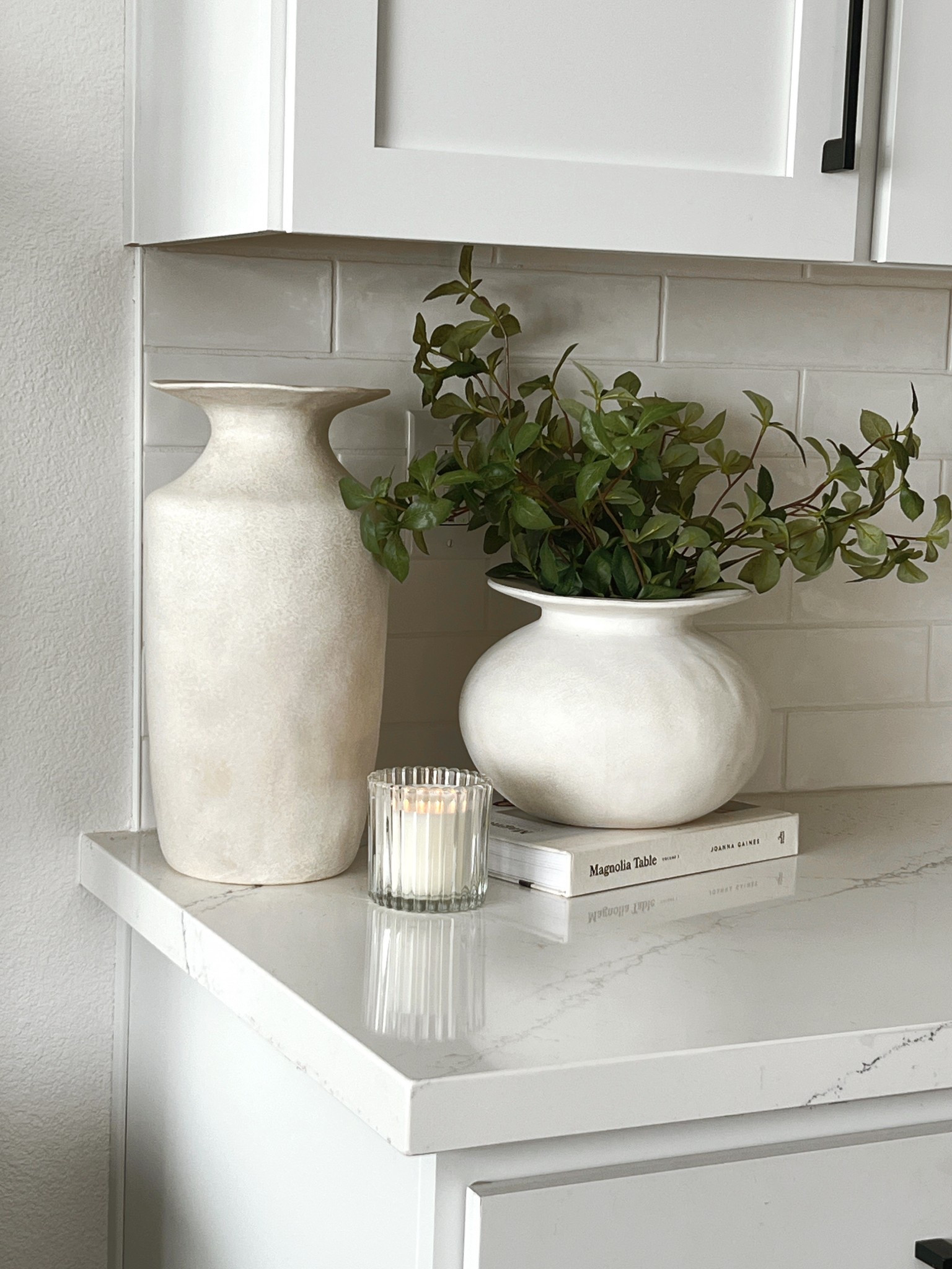 Kitchen counter refresh with neutral vase decor, vases, vase grouping, neutral counter decor

#LTKSeasonal #LTKHome #LTKWatchNow