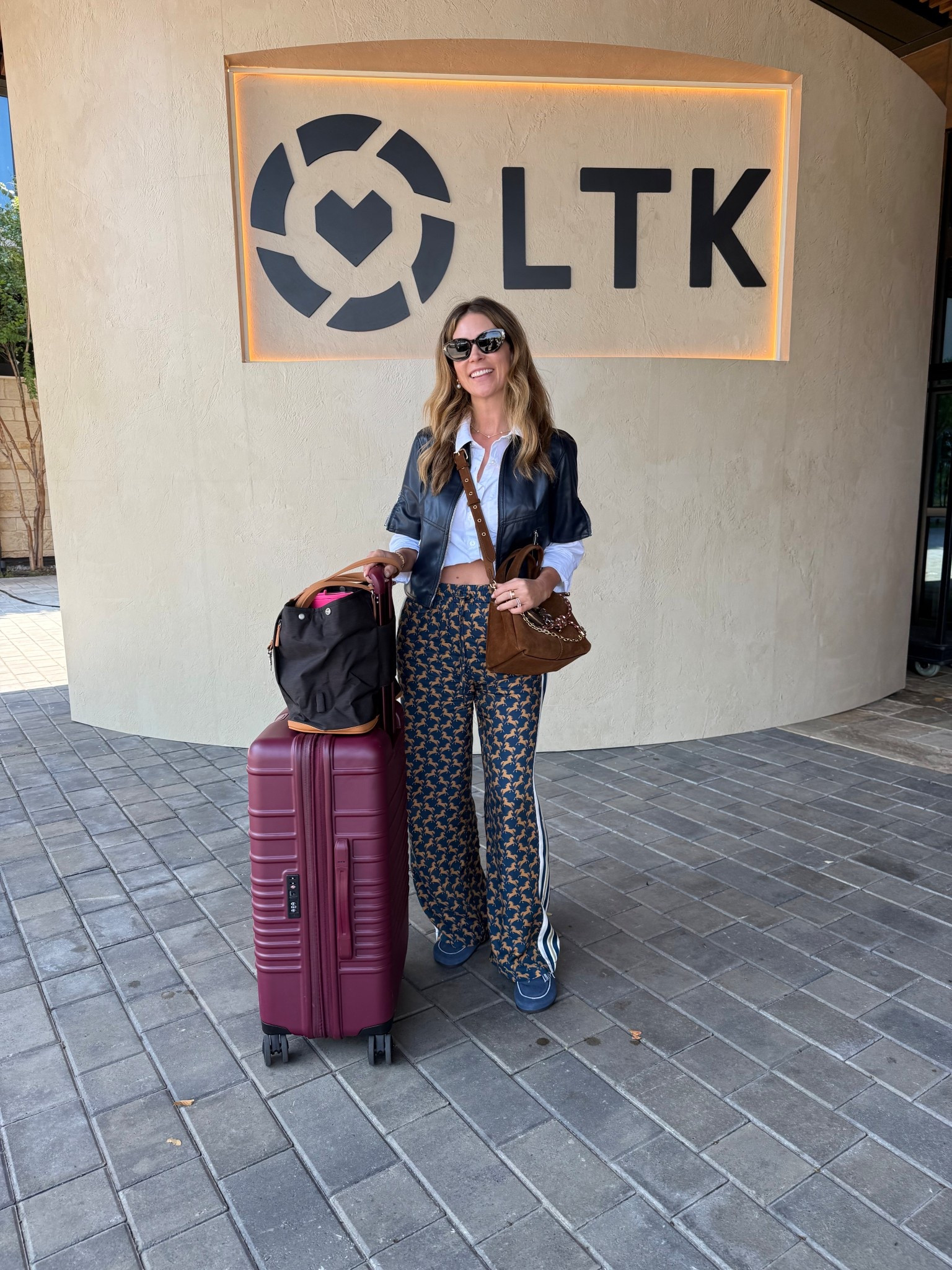 Today’s travel outfit! ✈️ Made it to LTKCon! 
Evereve faux leather short sleeve jacket size small
Cropped button down size small
Beis luggage
Nordace bag
Tom ford sunglasses 🕶️ 

#LTKPetite #LTKTravel #LTKStyleTip