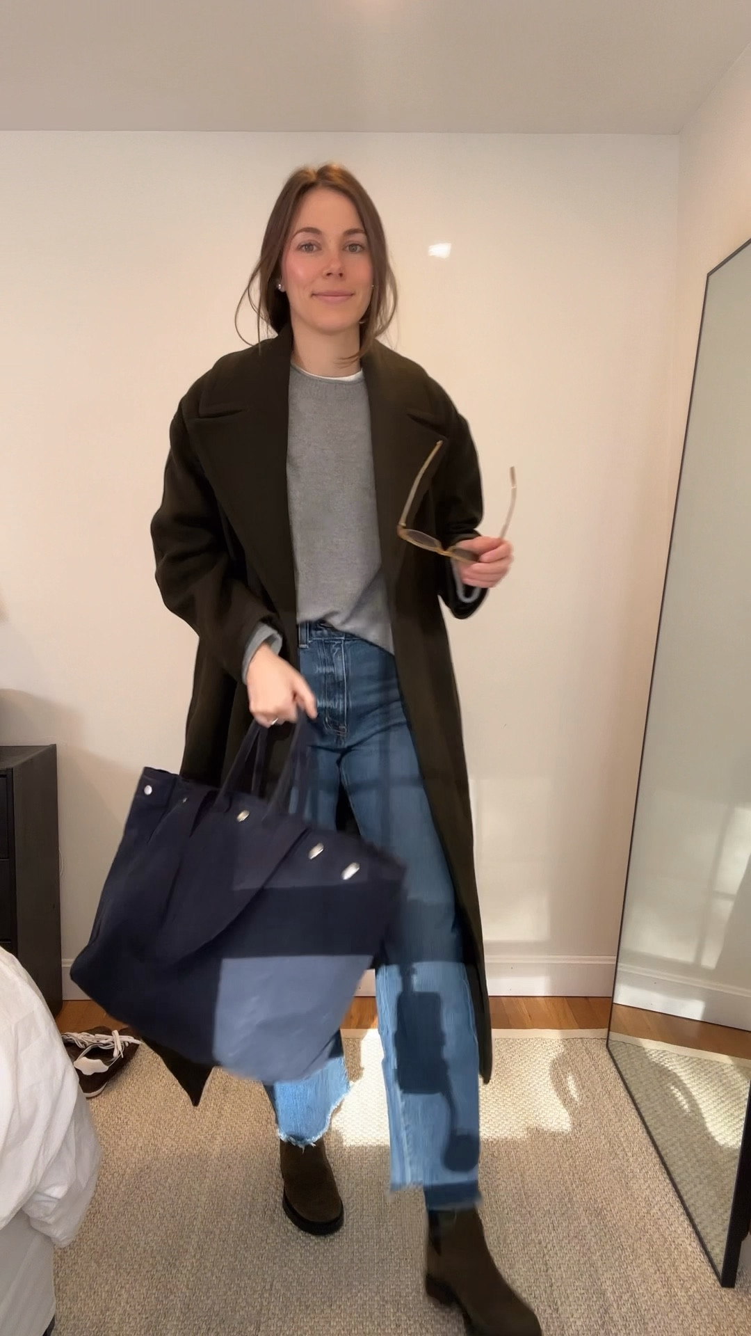 Sweater is sold out in grey but comes in a bunch of colors, TTS I wear a small. Also linked their classic cashmere crewneck that I also love. I size up to a medium in that. Jeans are no longer available in this wash, linked current washes, run TTS I wear a 26. Coat runs big I sized down to an XS. Boots run slightly big I would size down 1/2 size if you have narrow feet. Sunglasses are old garret leight purchased second hand.

#LTKFindsUnder100 #LTKSeasonal #LTKootd