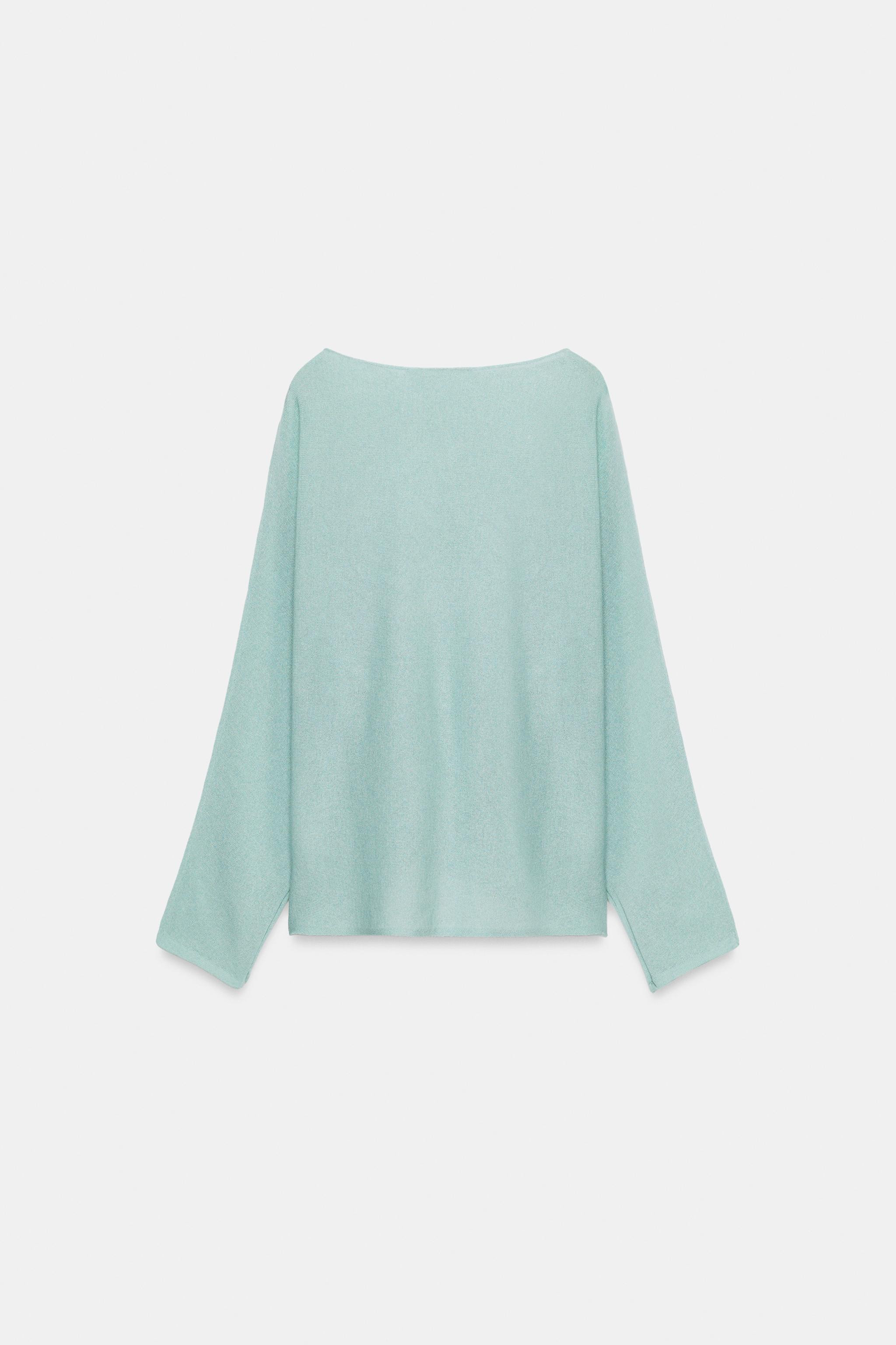 Model height: 178 cmBoat neck jumper. Long sleeves with slits and a wide armhole. Featuring promi... | Zara UK