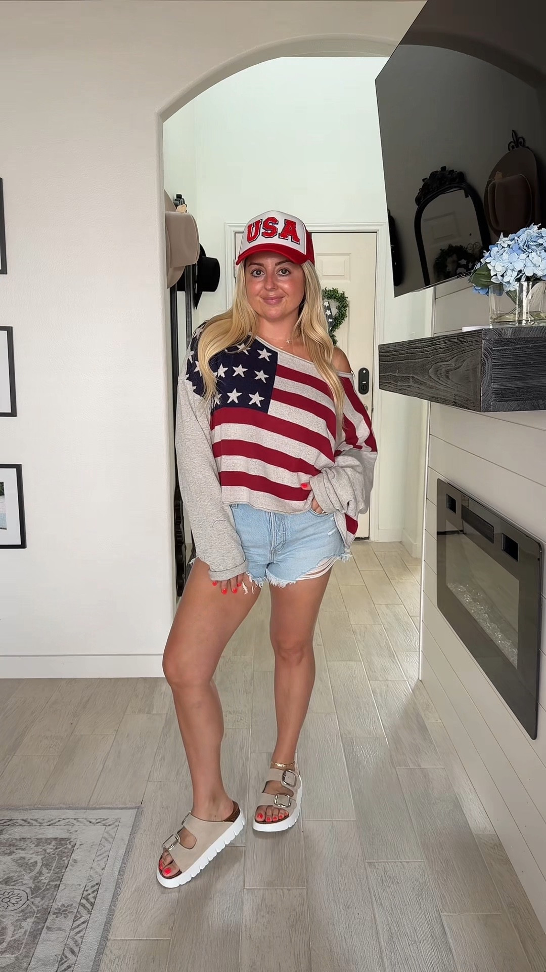 Memorial and 4th of July outfit❤️
Large USA flag sweater 
Denim shorts tts
Sandals tts