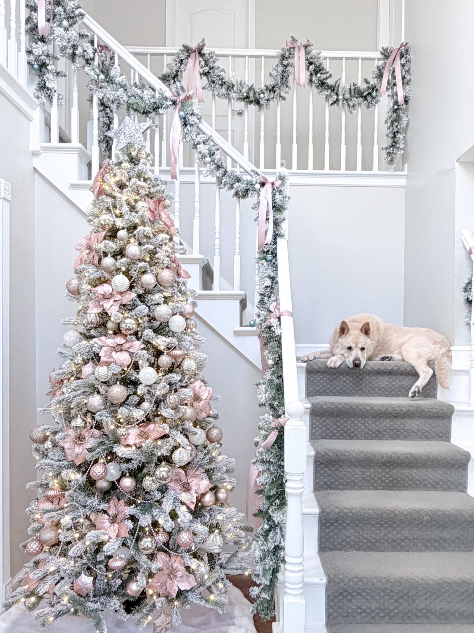 Pinkmas christmas tree! Flocked 8’ slim tree with lights, pink poinsettias, silver pearl garland, sequin star topper, blush, rose gold, glitter & pearlescent ornaments, with flocked garlands & pink satin ribbon bows.  

#LTKSeasonal #LTKHoliday #LTKHome
