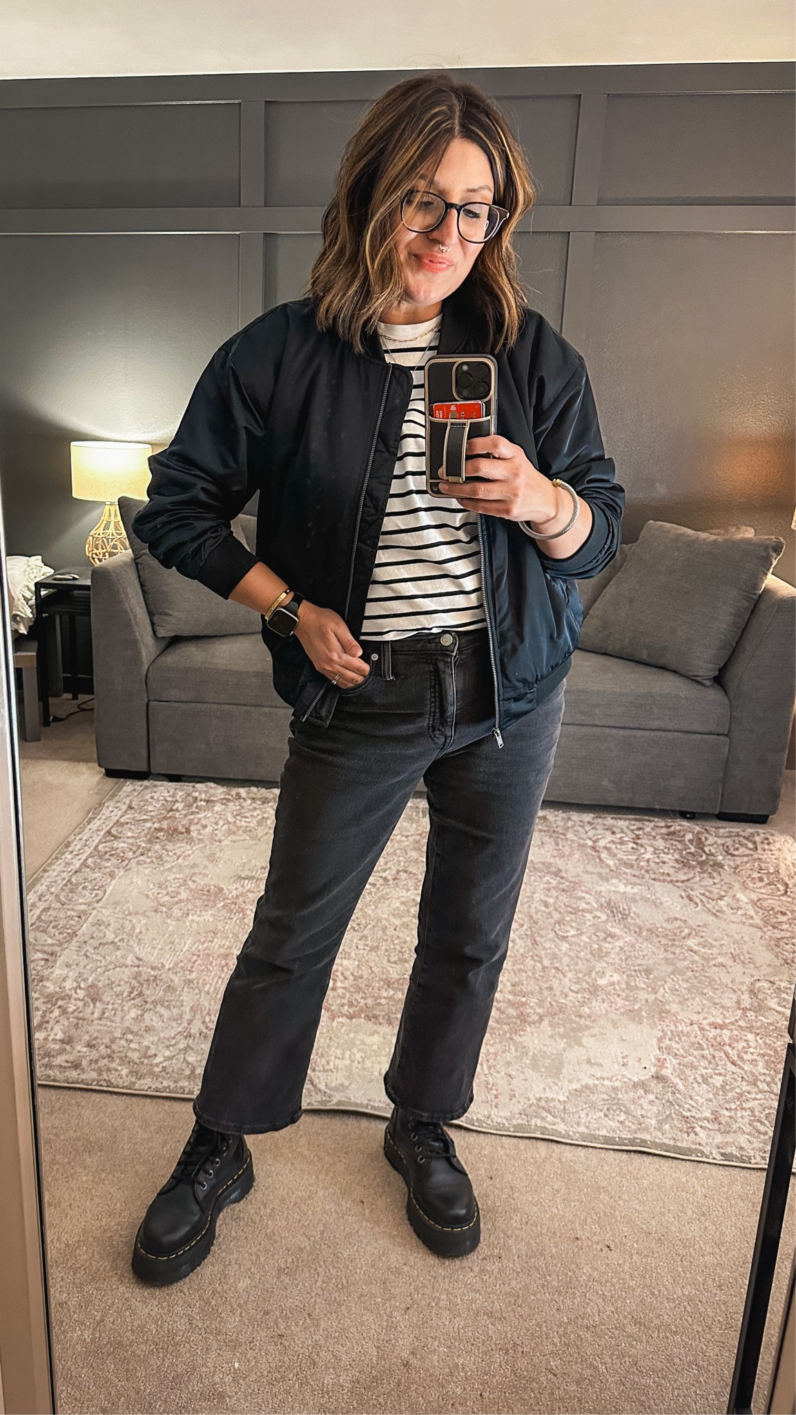 Black bomber jacket (L), old navy striped tee (L), Madewell kick out crop jeans (30), Doc Marten Jaden platform boots  

#LTKmidsize #LTKsalealert #LTKover40