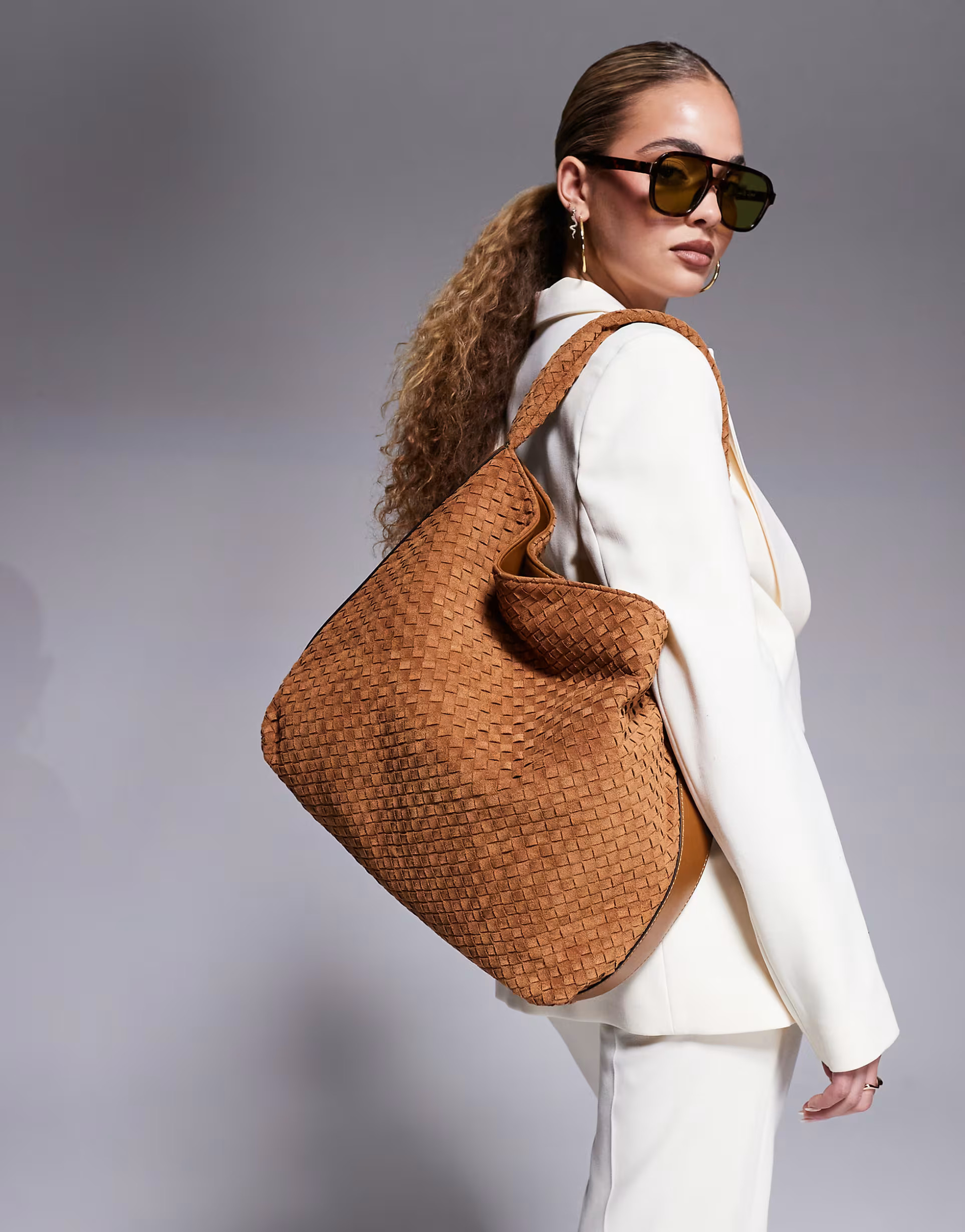 River Island suedette woven slouch bag in brown | ASOS (Global)