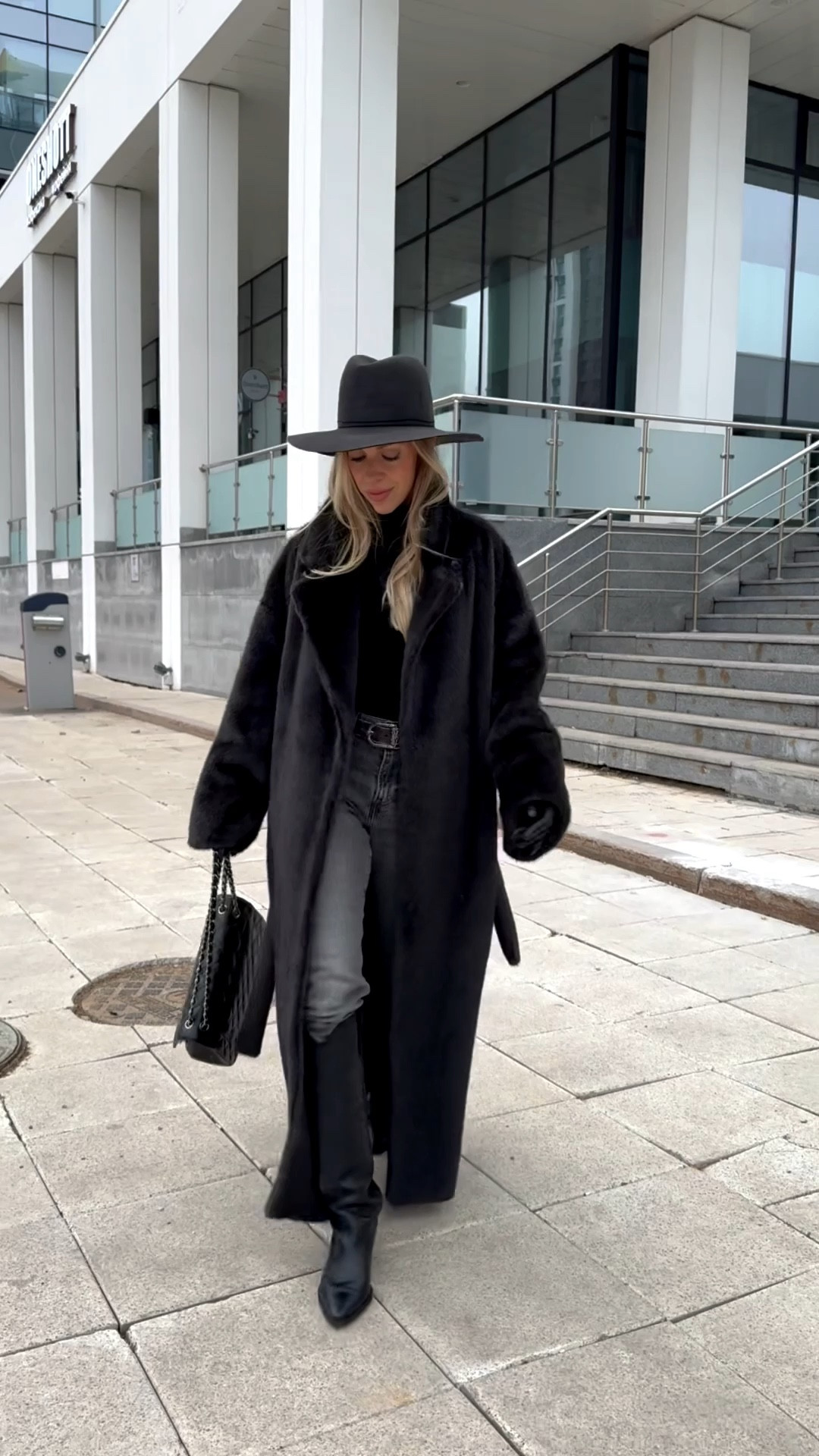 Dark gray faux fur coat, black and gray winter outfit, Levi’s gray slim straight jeans, black western boots, oversized faux fur coat 

#LTKFindsUnder100 #LTKOver40 #LTKSeasonal