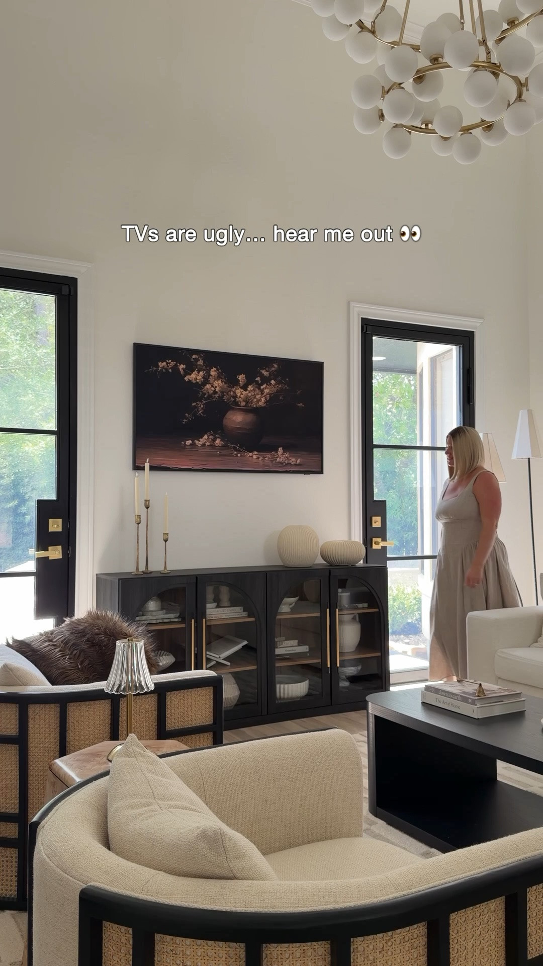 I never loved having a giant black screen as the focal point of my living room, which is exactly why I chose the Samsung Frame TV. Adding a DecoTV frame was the finishing touch that made it look even more like a custom piece of artwork instead of a TV.

Pro tip: Put your Frame TV in Art Mode, turn the brightness down, and increase the warmth for the most realistic art look. It makes such a difference!

Frame : Tuscan Matte Black 🖤

#LTKHome