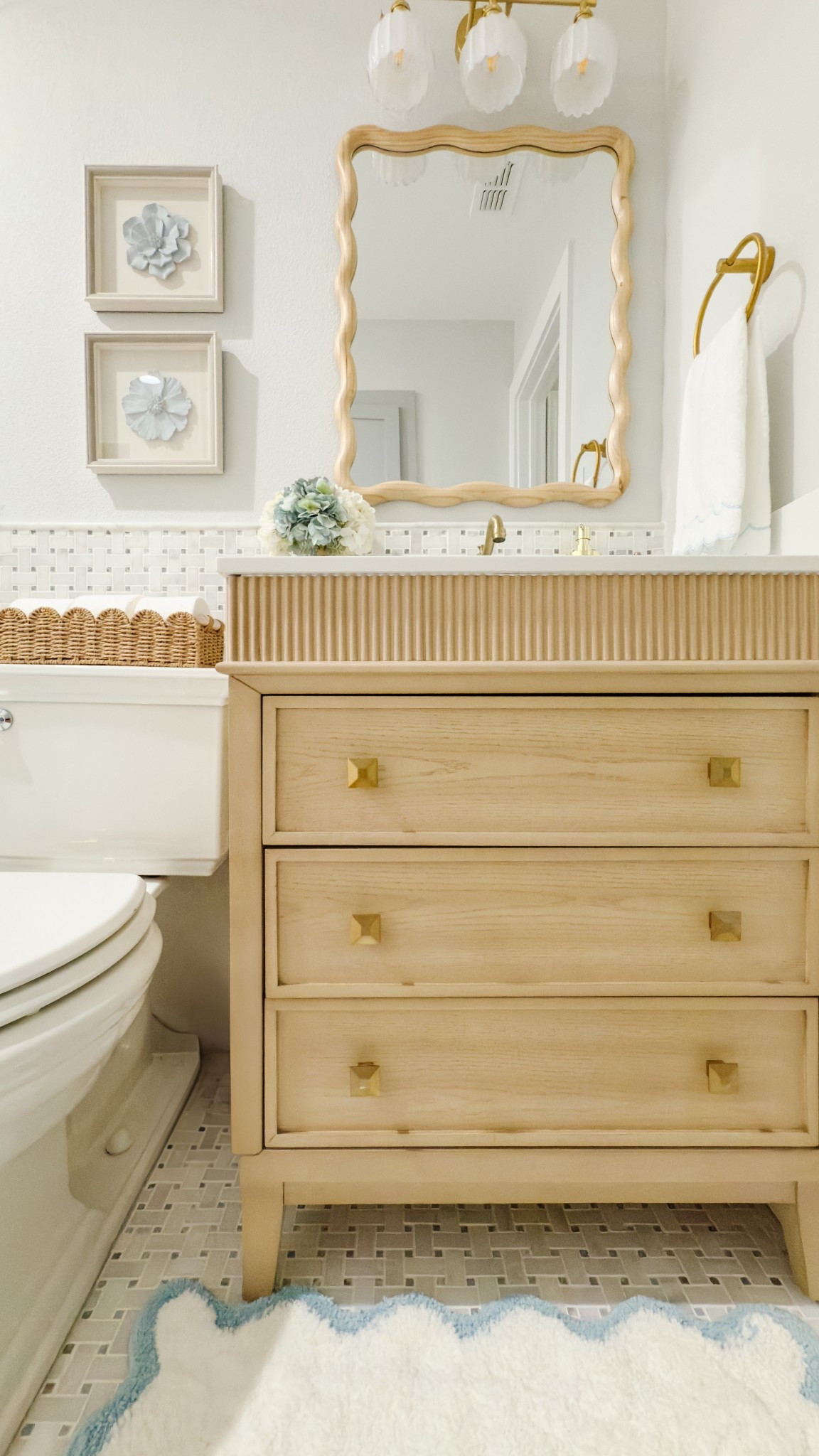 Soft scalloped touches for any bathroom—classic, charming, and easy to mix in.
Includes the exact mat, towel, mirror, light, and more I used.

#LTKFindsUnder50 #LTKHome #LTKStyleTip