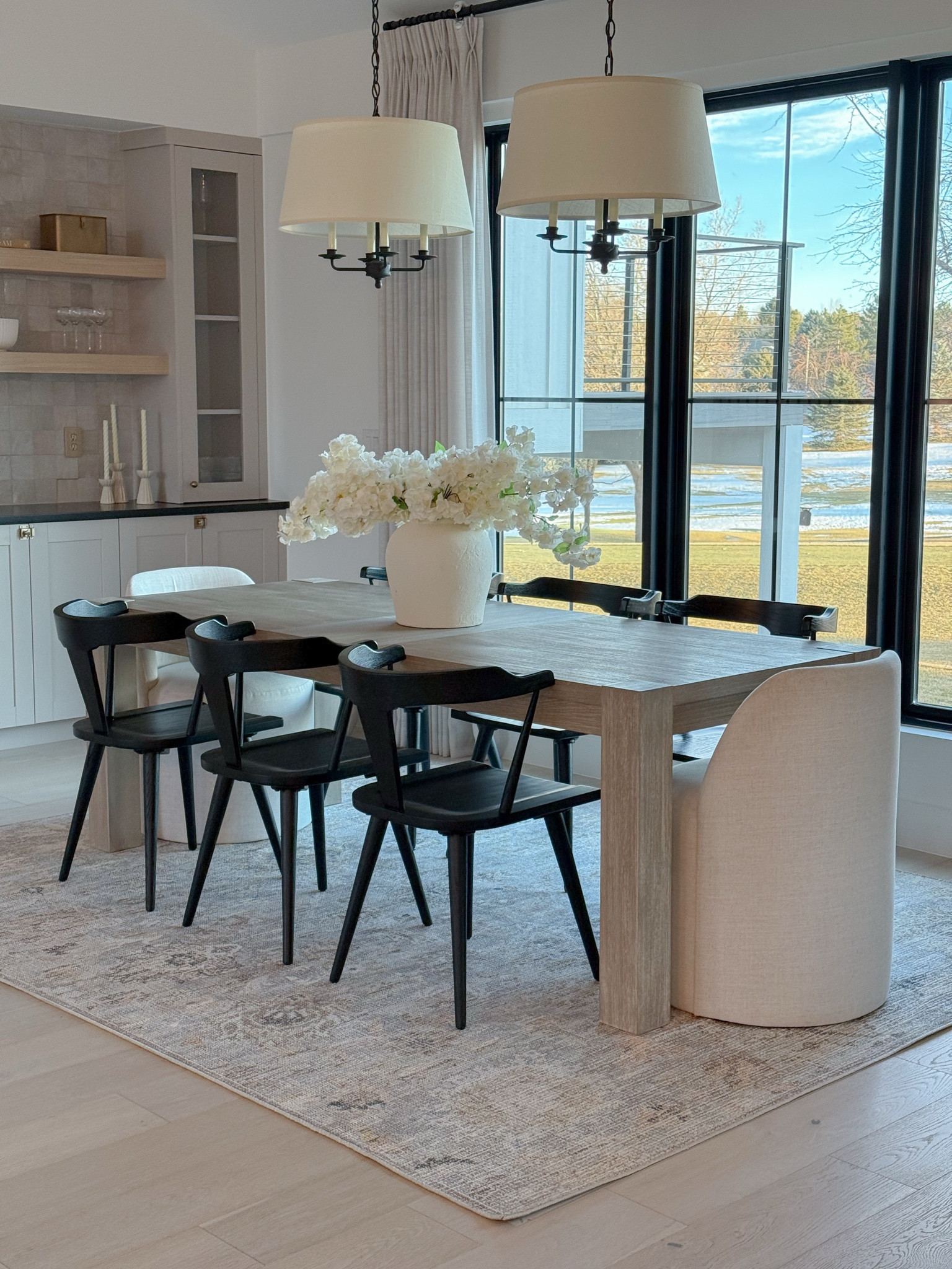 Our dining room is finally coming together, and I’m loving how warm and inviting it feels! The mix of wood tones, cozy neutrals, and bold black chairs adds just the right amount of contrast. If you’re thinking about refreshing your space, you can find similar pieces through my LTK!

#LTKHome #LTKFindsUnder100 #LTKStyleTip