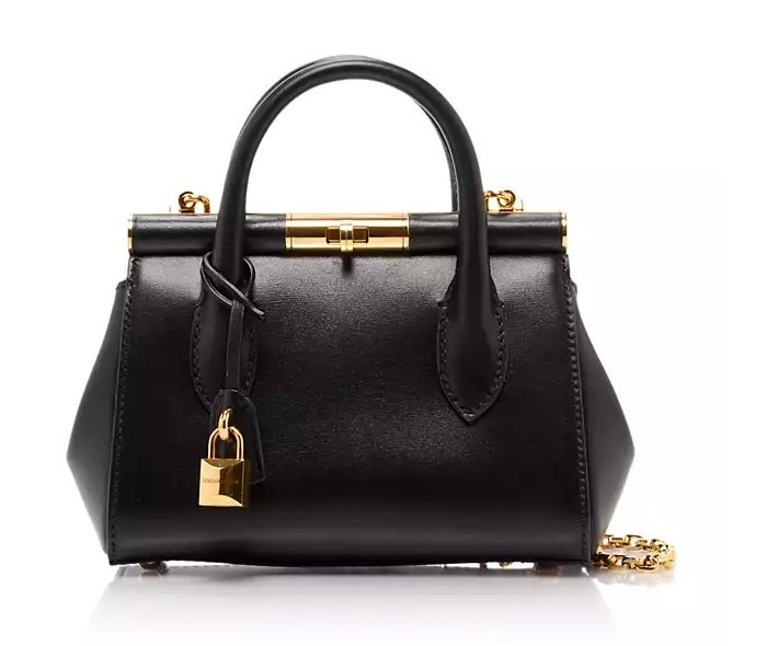 It’s a splurge but she is PERFECT. Dolce & Gabbana black and gold handbag #dolceandgabbana #purse #luxury #chic

#LTKItBag #LTKStyleTip