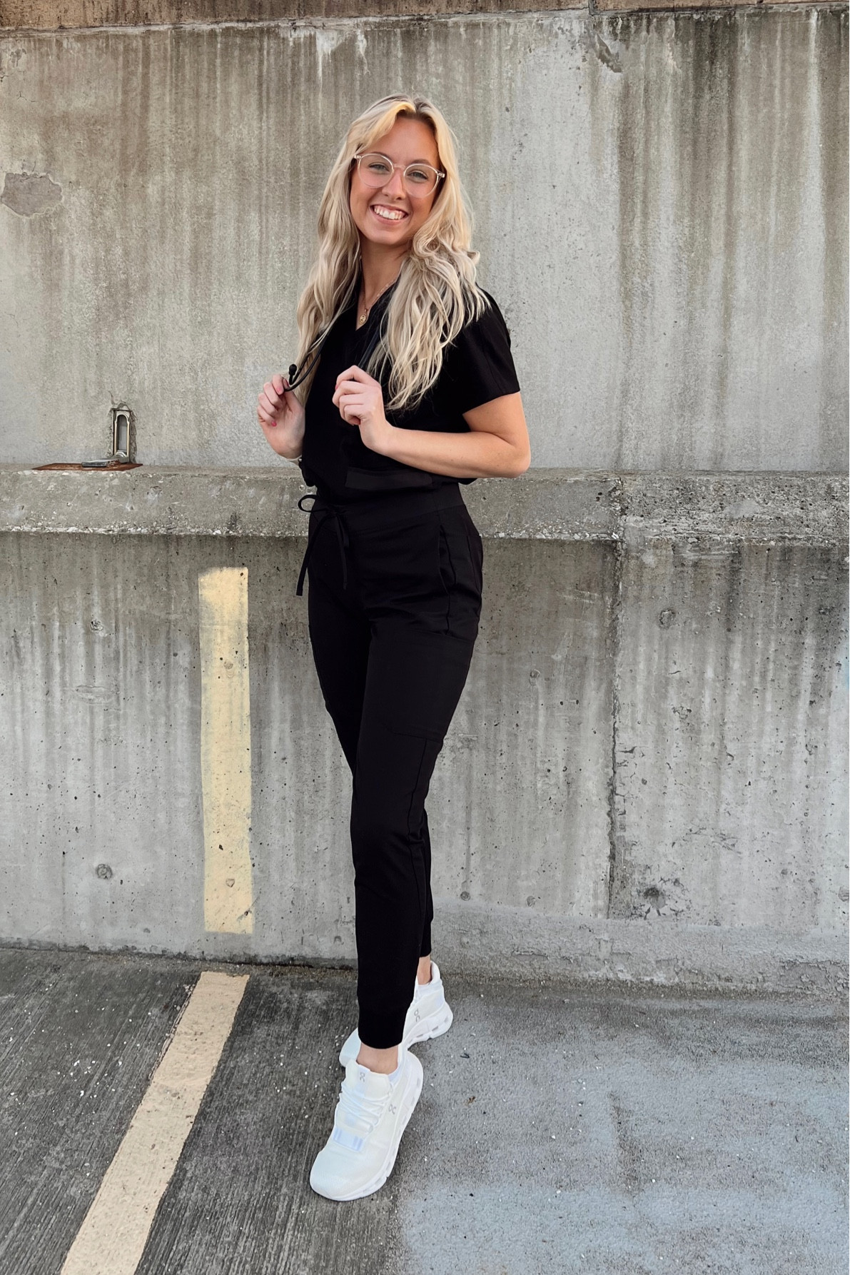 black out scrubs fit! 🖤🩺 wearing size xs in my figs top and size xs in my high waisted mandala scrubs with my MDF black stethoscope! Adding some white with my on cloud tennis shoes size 7! 

#LTKU #LTKworkwear #LTKFind