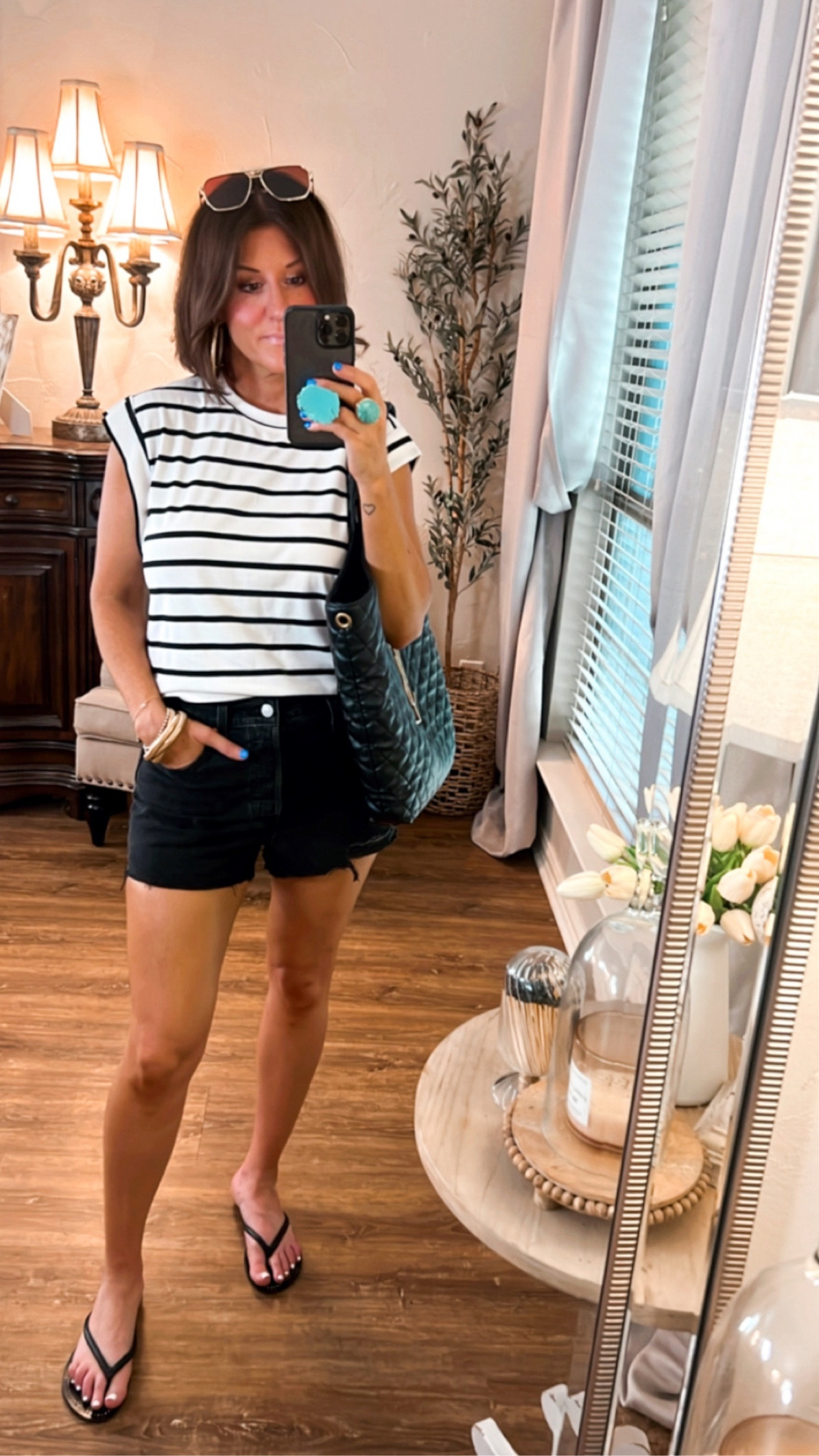 Walmart shirt, wearing size medium.  Levi’s shorts, sized up one since it is 100% cotton  

#LTKover40 #LTKstyletip