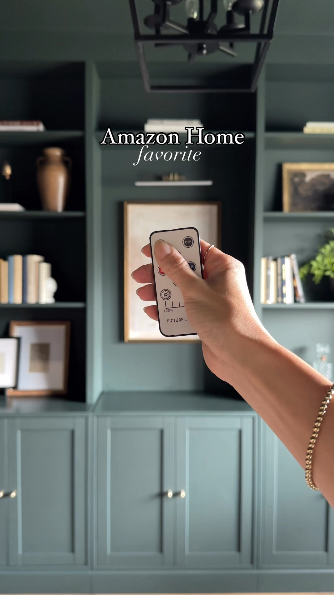 I absolutely love this trick for hanging a picture light anywhere without the trouble of hardwiring! 

This is the 16” antique brass

The charge lasts anywhere from 12-15 hours, but the remote has a 1-4 hour timer option to turn off automatically! 

#amazonfinds #amazonhome #diyhome #homeprojects #homeimprovement #homehacks #homedesign #walldecor #walldecorideas #homedecor #homehack #builtins 

#LTKVideo #LTKFindsUnder50 #LTKHome