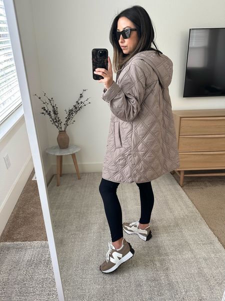 Bernardo quilted jacket in the color frappe. Wearing the xs. Love this fit. Sort of has a trapeze fit. Hits above the knee. Which the color was more beige than taupe. 

Bernardo jacket xs
Everlane tee medium
Amazing Legging xs
New Balance 327 size 4 men’s. 
YSL sunglasses  

#LTKshoecrush #LTKsalealert