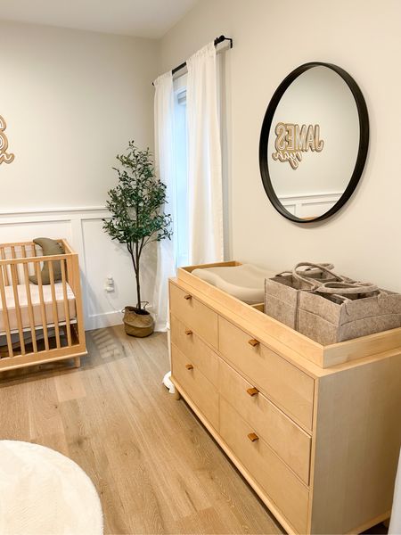 Neutral baby nursery 🐻

• baby room, west elm crib, west elm changing table, target black round mirror, Amazon finds, Amazon olive tree, keekaroo peanut changing pad, buy buy baby, Babylist, baby registry, pottery barn kids, diaper caddy, gathre moon pillow, leather pillow, faux fur round rug, baby style, nursery decor, hatch sound machine, target white floor length curtain panels 

#LTKhome #LTKbump #LTKbaby