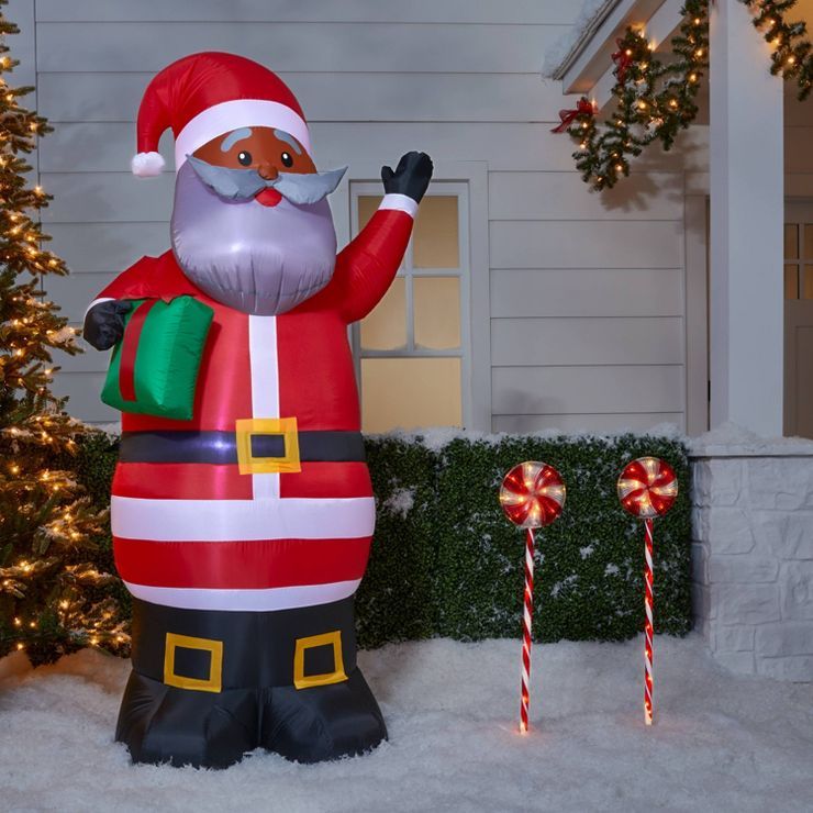 6.5' Santa with Gift Inflatable Christmas Decoration - Wondershop™ | Target