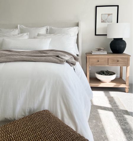 Upholstered bed, neutral bedding, white oak nightstand, bedroom decor, linen bed, neutral bed frame, white bedding, bedroom rug 

#LTKStyleTip #LTKHome #LTKFindsUnder50