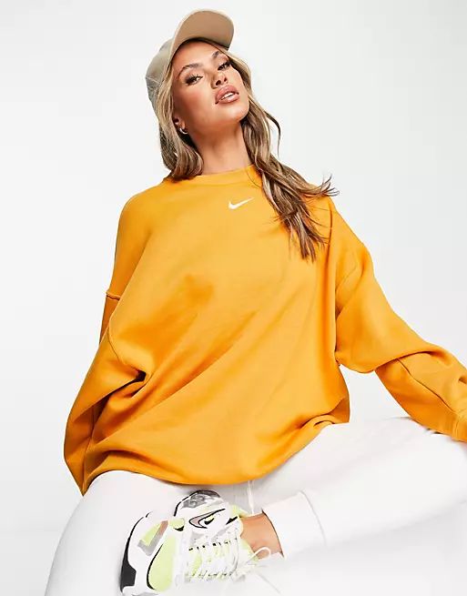 Nike mini swoosh oversized crew sweatshirt in yellow | ASOS (Global)