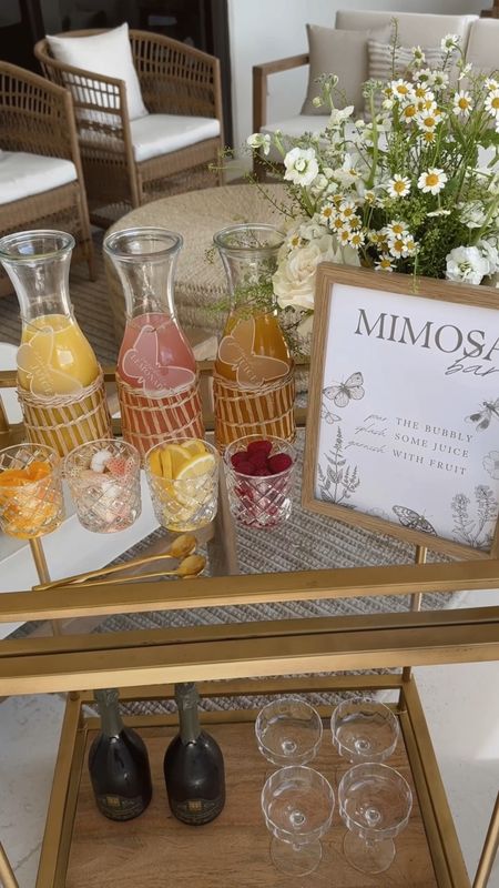 Mimosa bar cart for spring 🥂🌸🤍

#mimosa #mimosabar #barcart #easter #easterbrunch #spring #springbrunch #mimosasign #printable #homedecor #easterdecor #springdecor 

#LTKhome #LTKparties #LTKSeasonal