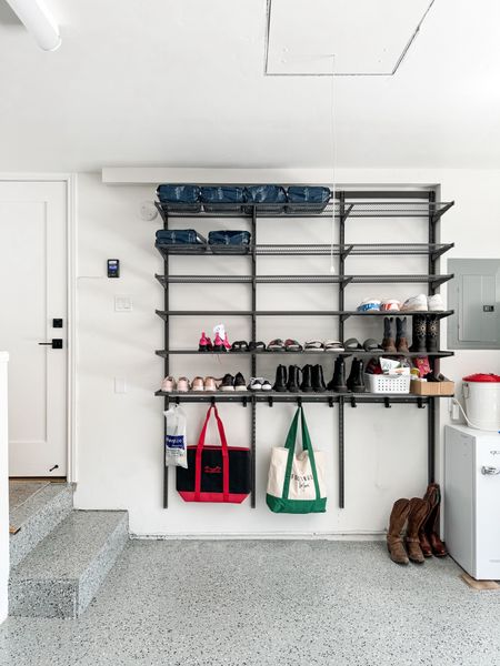 The key to an organized garage? Creating defined zones. In this garage, I used this wall near the entry to hang bags of all kinds and drop shoes. I love this new Garage product and it’s currently on sale guys! 🖤

#LTKsalealert #LTKSeasonal #LTKhome