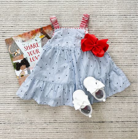 Adorable blue and white striped ruffled tiered dress paired with white bow shoes and red bow for baby girl during spring and summer! Perfect for Independence Day and fits up to 5T

#LTKBaby #LTKKids #LTKStyleTip