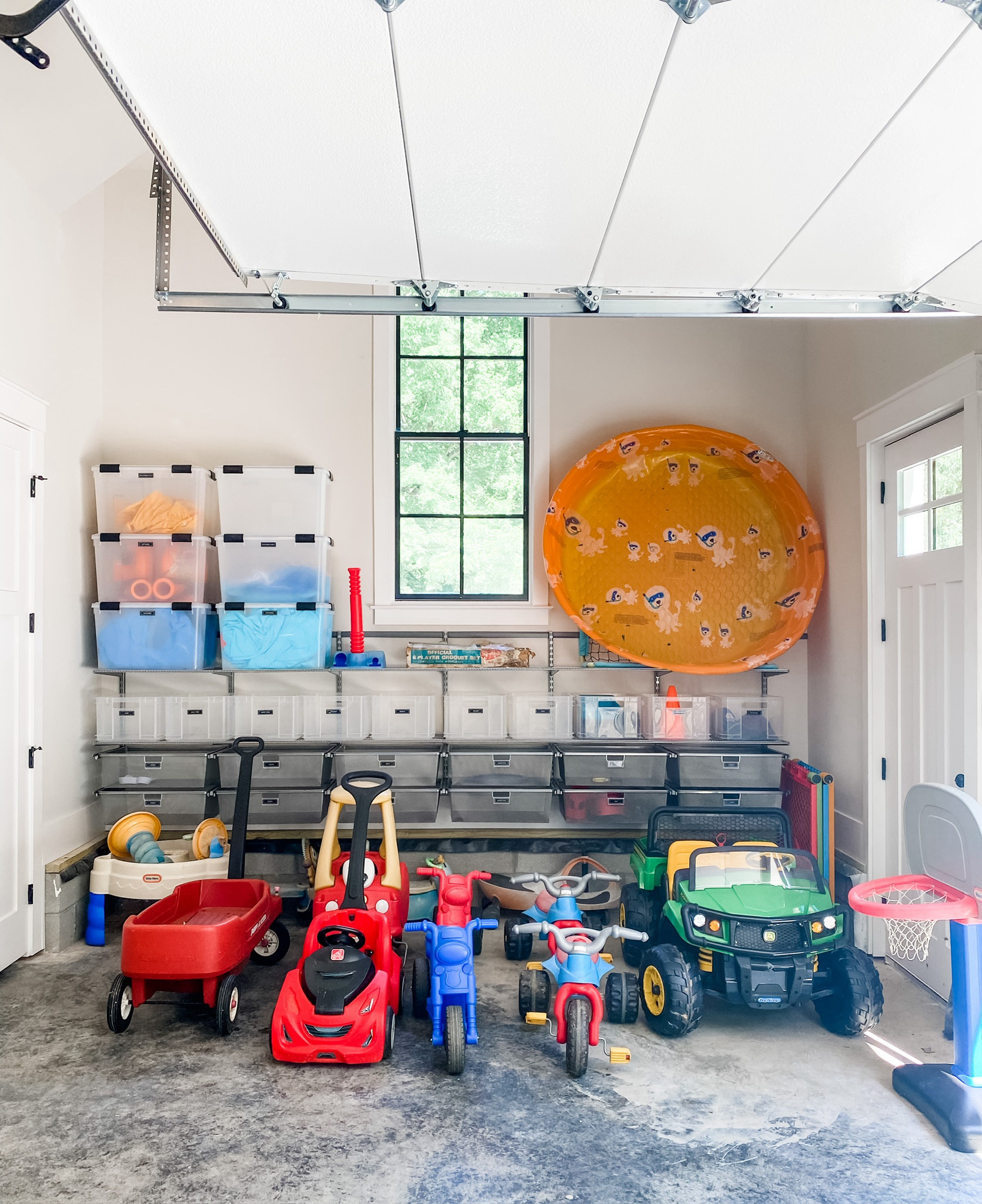 The ultimate kids garage toy storage area! This system works for anything but is especially great for kids and all their outdoor toys and sports items!

#LTKkids #LTKSeasonal #LTKfamily
