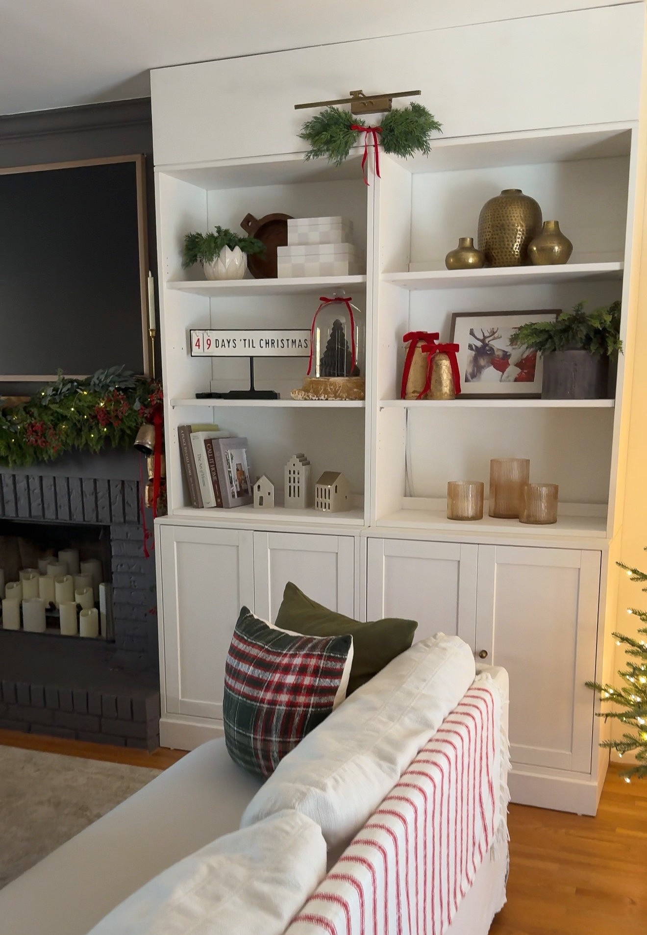 Christmas views in my home: living room 

Bookcases: ikea havsta 

I’ve linked everything I can (and a few alternatives), Many items I have collected over the years and aren’t linkable (brass vases, checker boxes, Christmas countdown) 

#LTKHome #LTKHoliday #LTKSeasonal