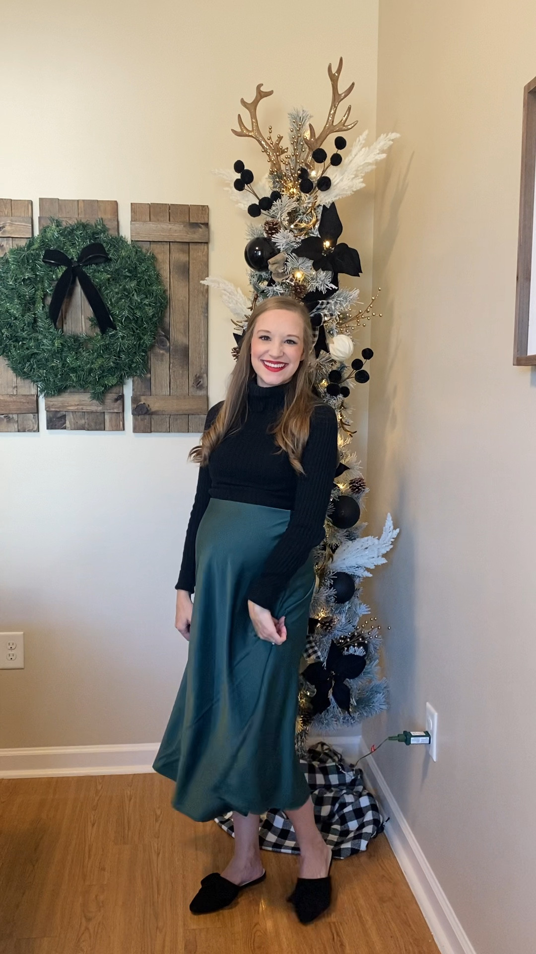 Christmas outfit idea! Holiday outfit idea! Christmas family picture outfit idea!! Amazon green skirt paired with a black turtleneck and back bow mules!! 

#LTKHoliday #LTKSeasonal