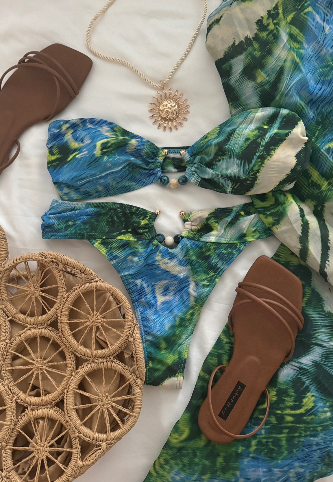 Bikini Outfit ( wearing size 4 in the bikini top and size 8 in the bikini bottoms, the bottoms run small I had to size up one!)

Vacation outfit | beach club outfit | beach day outfit 

#LTKSwim #LTKFindsUnder50 #LTKStyleTip