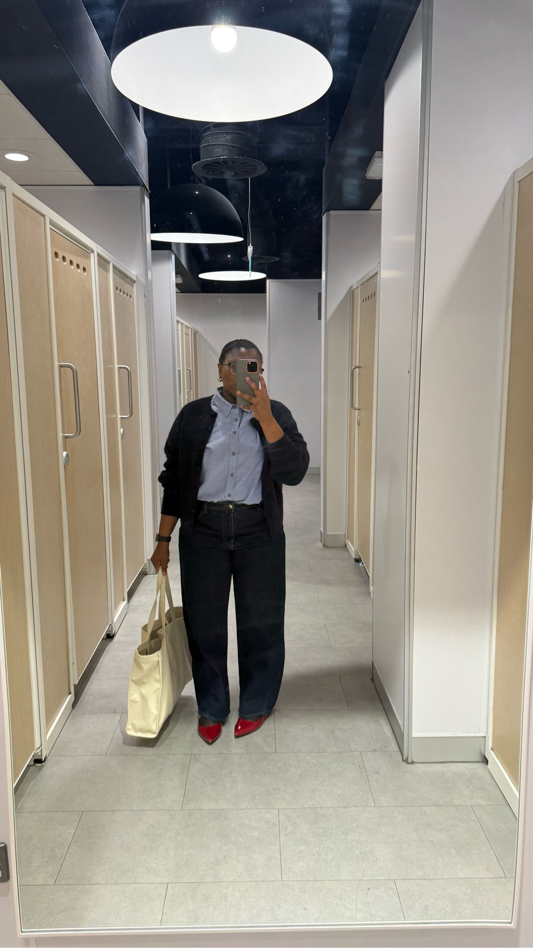 What I wore to the office today: a sleek black cardigan over a crisp collared shirt, classic dark trousers, and vibrant red pointed flats. Perfect blend of comfort and chic!  #OfficeStyle #WorkFashion #OOTD #ChicAndComfy #FashionInspo #ProfessionalLook

#LTKspring #LTKstyletip #LTKworkwear