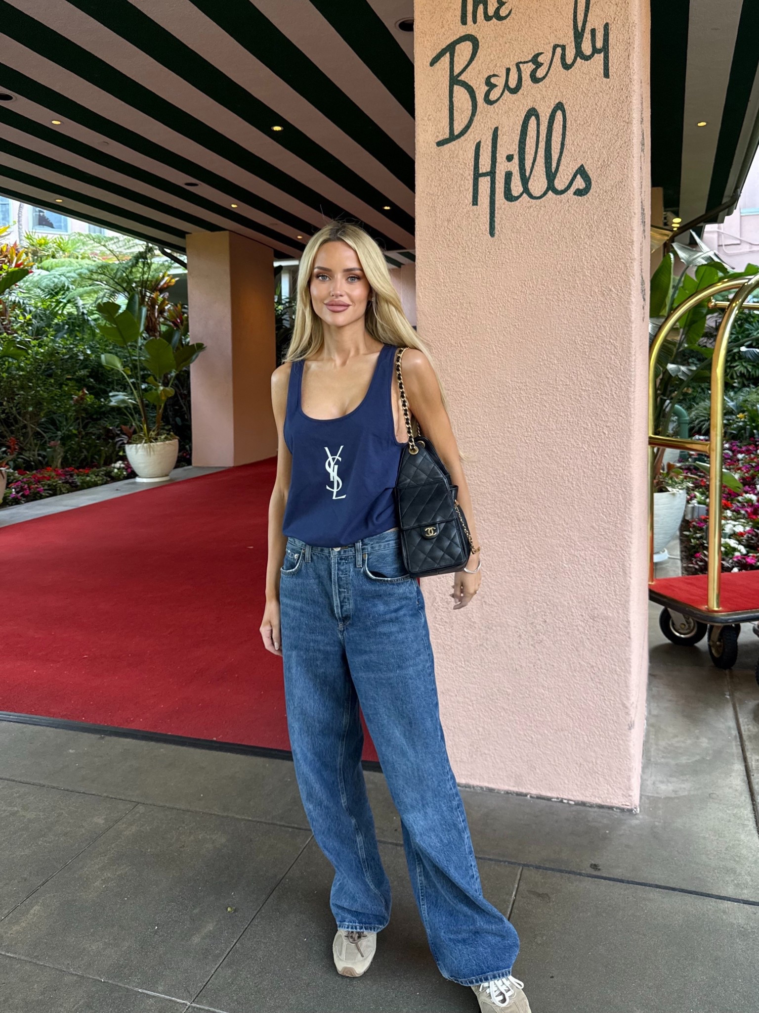 The Beverly Hills Hotel 
New YSL tank top size smalll
Chanel 25 bag
Blue denim jeans size 23
Miu miu shoes 