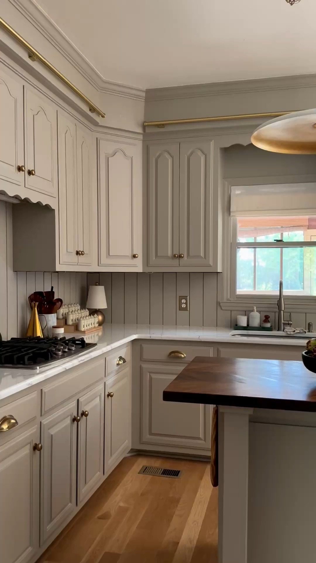 This kitchen is my favorite room to wake up to. Warm taupe cabinets, a walnut butcher block island, the best brass pendant, and all the little vintage details that make it feel collected over time. Everything I could link is linked above.

#LTKmorningroutine #LTKHome #LTKdayinmylife