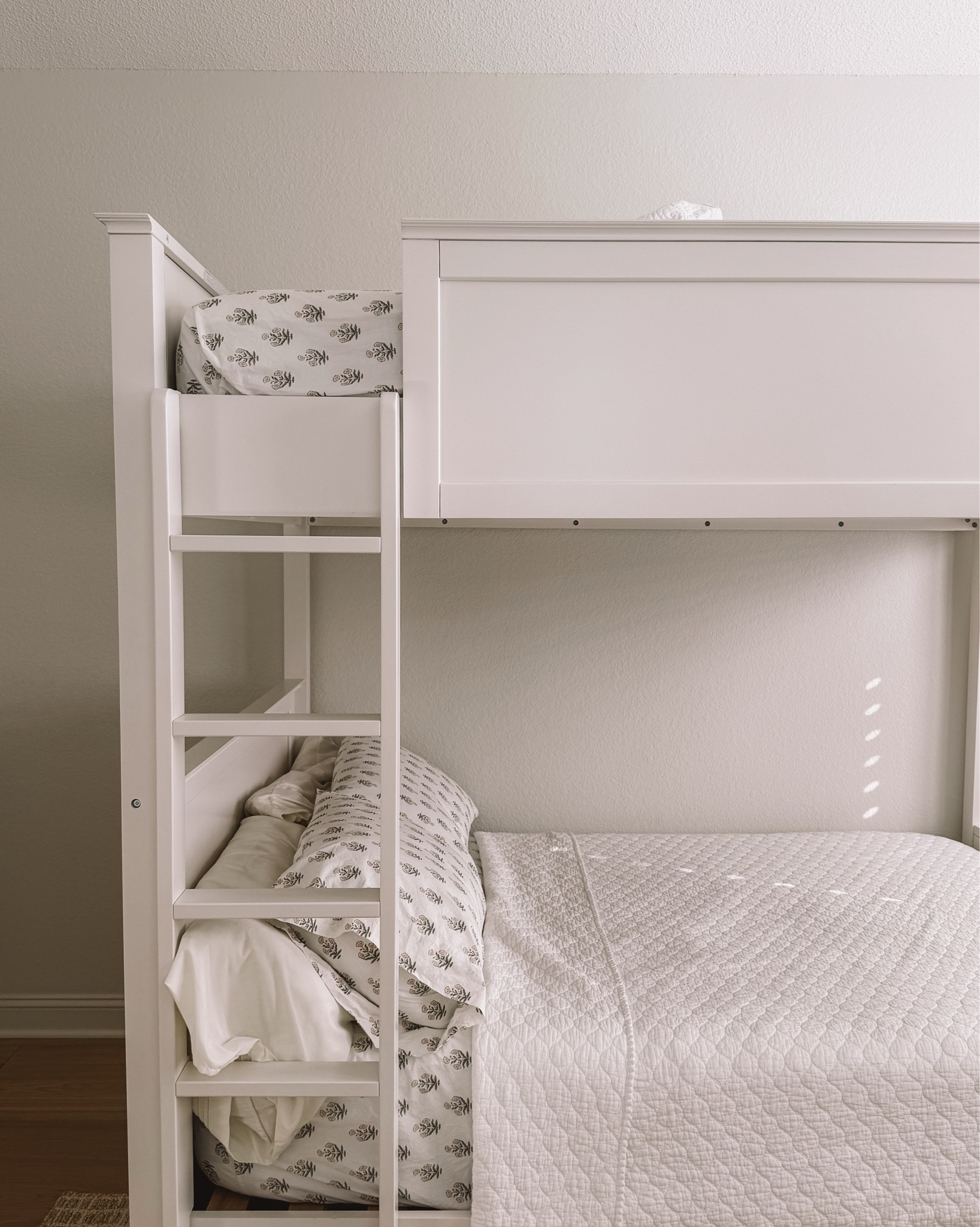 The bunk beds are full over full, so they'll grow with the kids—and handle cousins, crash pads, or rainy movie nights with ease. The woven rug adds just enough coastal texture without feeling too on-the-nose, and while the room’s not entirely finished, this whimsical Anthropologie tapestry might be my favorite touch. 


#BeachHouseKidsRoom #CoastalKidsRoom #AnthroHome #LTKhome #meltedandmovedstyle #BeachHouse #beachdesign #bunkbeds #potterybarn 


#LTKHome #LTKKids