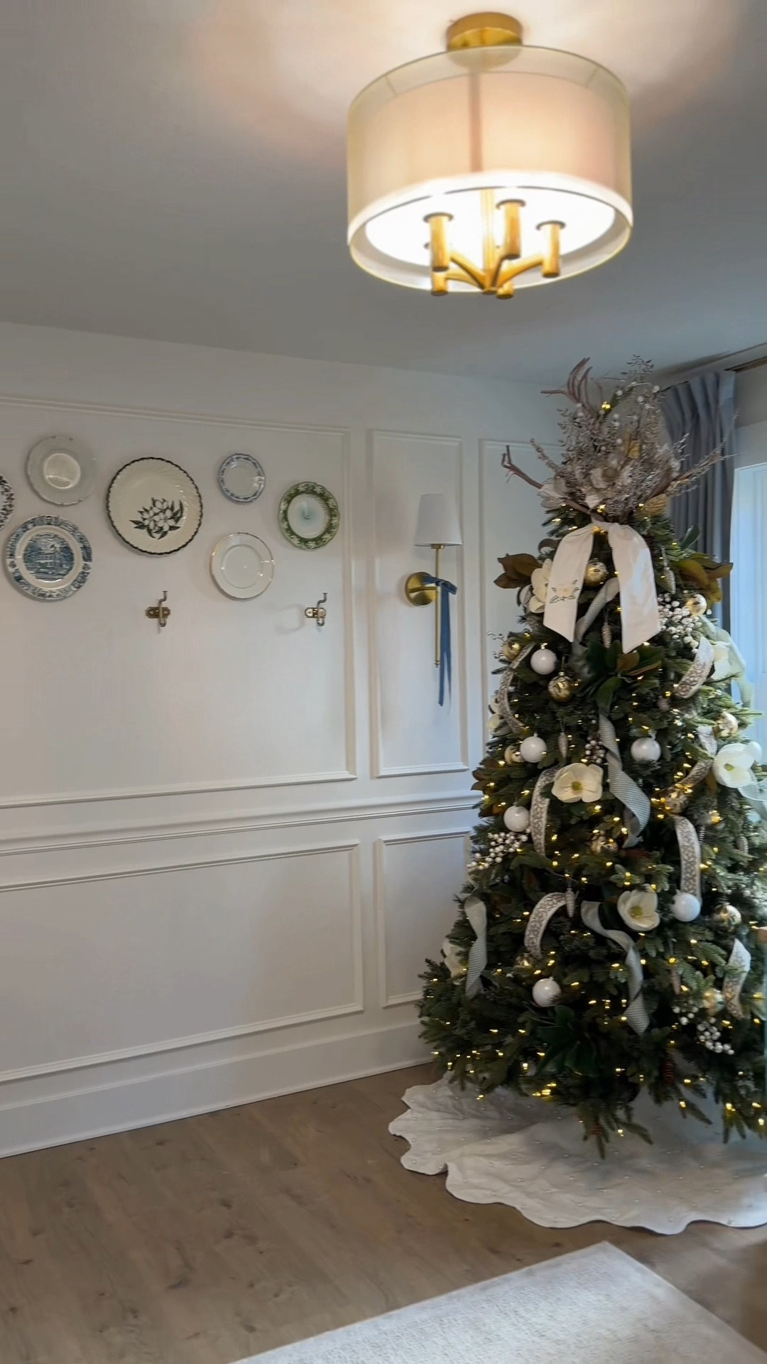 12 Days of Christmas Decorating Series — @Magnolia & Pine Co. Boutique tree 🤍🎄 I’m in here every day packing orders and working, so adding a little tree just makes it feel warm and home-y.
I kept it simple with the same blue and magnolia touches to match the rest of the house! #12daysofchristmas #holidaydecorating #christmastree #christmas2025 #decoratewithme  

#LTKSeasonal #LTKHoliday #LTKHome