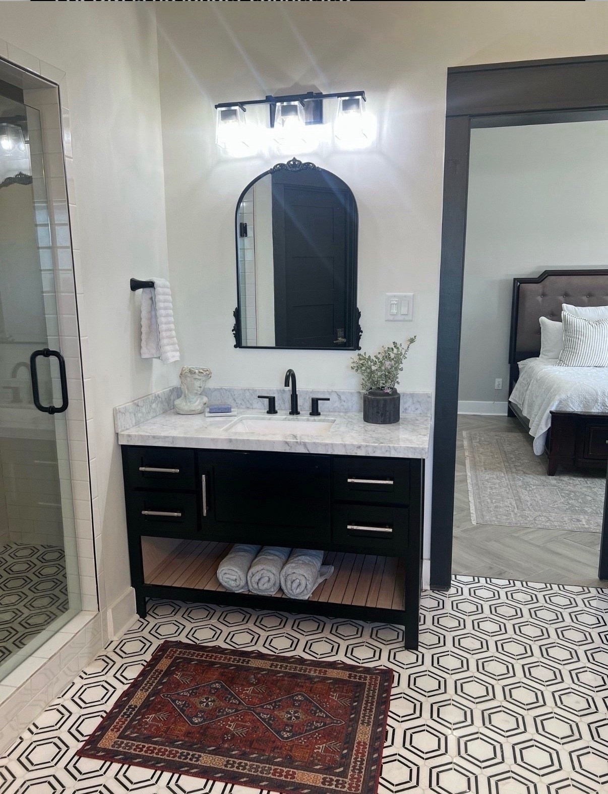 Bathroom Style
•
#blackandwhitebathroom #bathroom #hexagontiles #marbletile #mirror #blackmirror #brushednickelvanity #blackfaucet #silvercabinetpulls #pillows #quilt #throwpillows #bathmat #redreug #bathrug #vanitylught #faucet #bedroom #bathroom

#LTKhome #LTKFind
#LTKStyleTip #LTKFamily 

#LTKmorningroutine #LTKHome #LTKgrwm