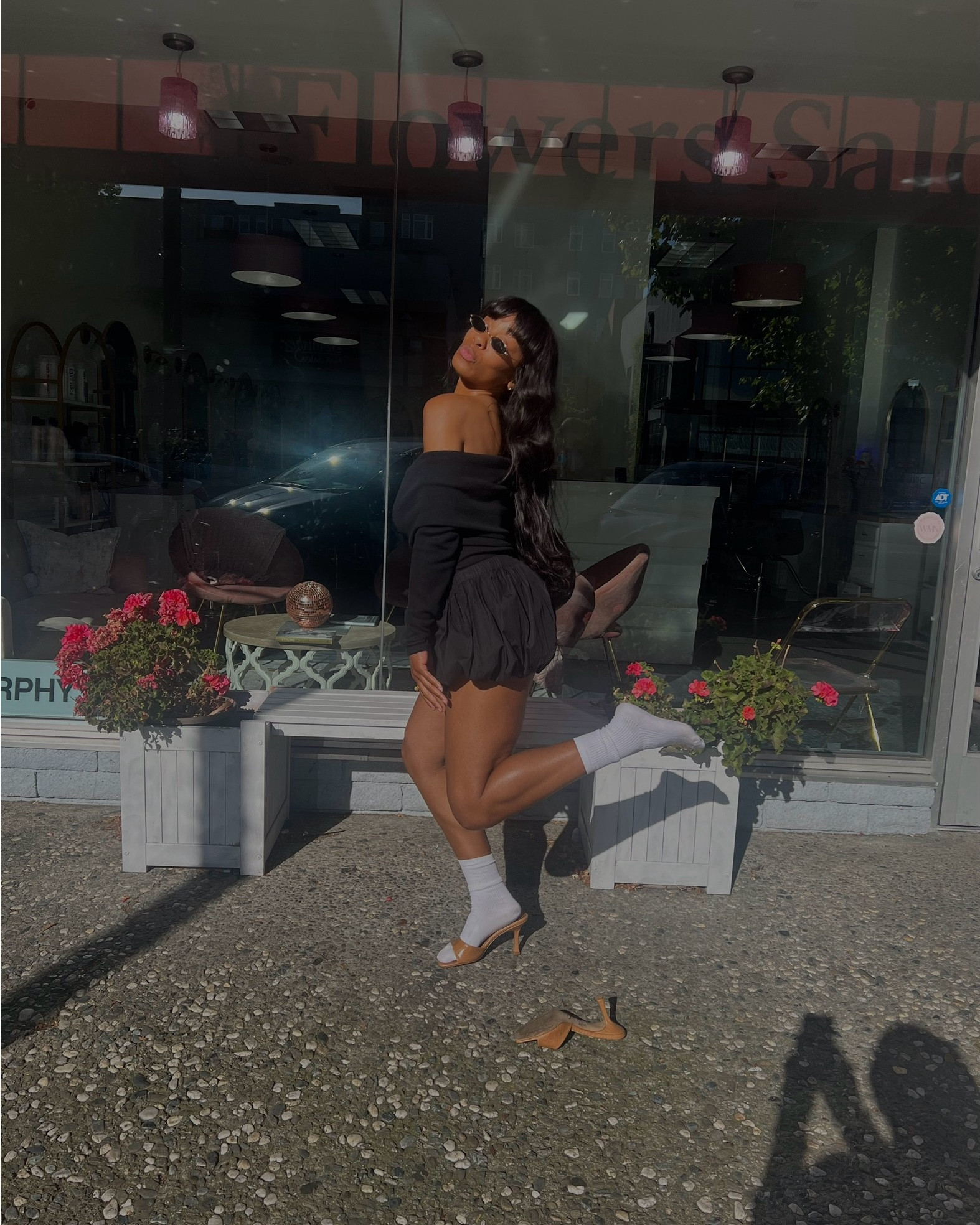 off the shoulder skirt, mini shorts, white socks, tan slip on heels.

#LTKStyleTip #LTKItBag #LTKShoeCrush