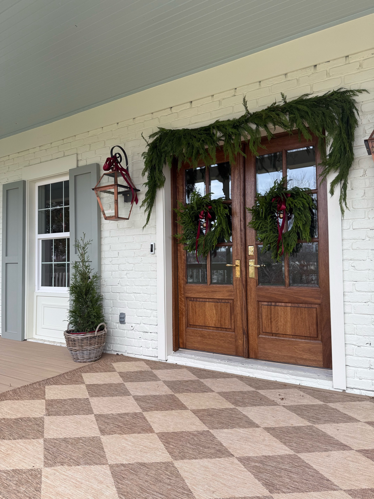 Front door decor / exterior gas lantern lights

Paint: French canvas by BM
Blue ceiling: Wedgewood Gray
Shutters: Pigeon by FB
Stain: Special Walnut

#LTKHome